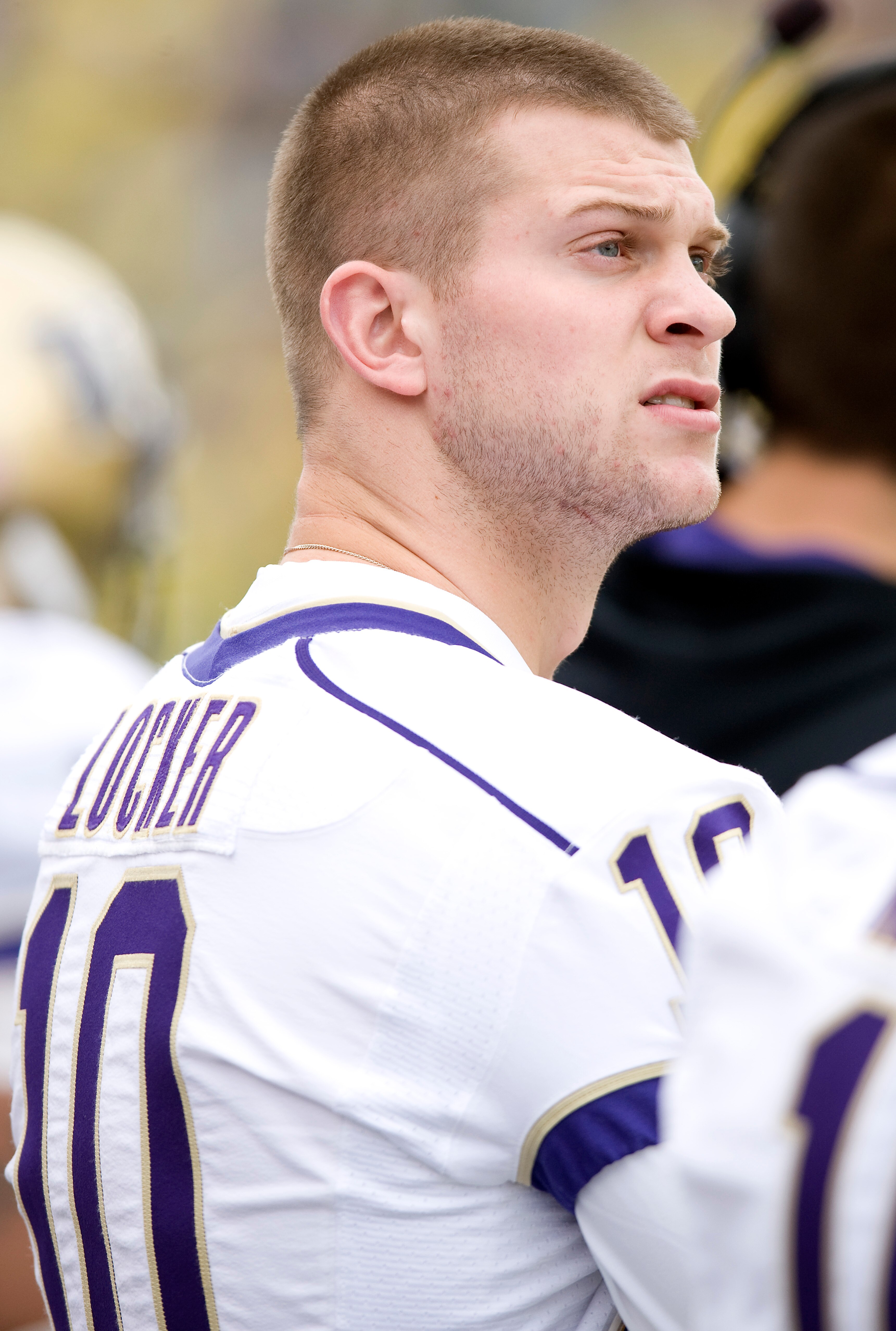 EUGENE, OR - NOVEMBER 6: Injured quarterback Jake Locker #10 of the Washington Huskies watches the action from the bench in the third quarter of the game against the Oregon Ducks at Autzen Stadium on November 6, 2010 in Eugene, Oregon. The Ducks won the g