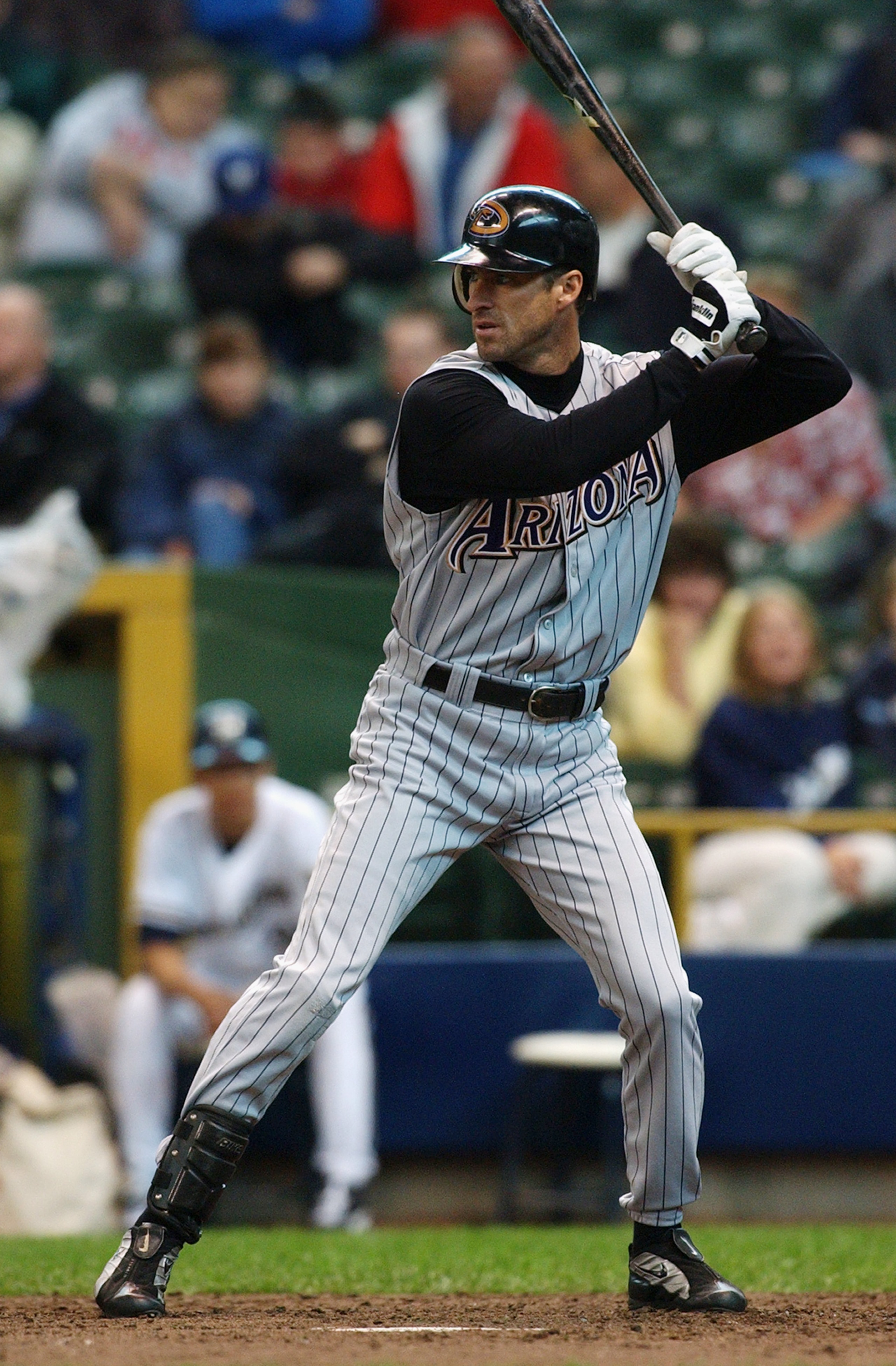 MILWAUKEE, WI - APRIL 22:  Center fielder Steve Finley #12 of the Arizona Diamondbacks readies for a pitch during a game against the Milwaukee Brewers at Miller Park on April 22, 2004 in Milwaukee, Wisconsin.  The Diamondbacks defeated the Brewers 11-9 in