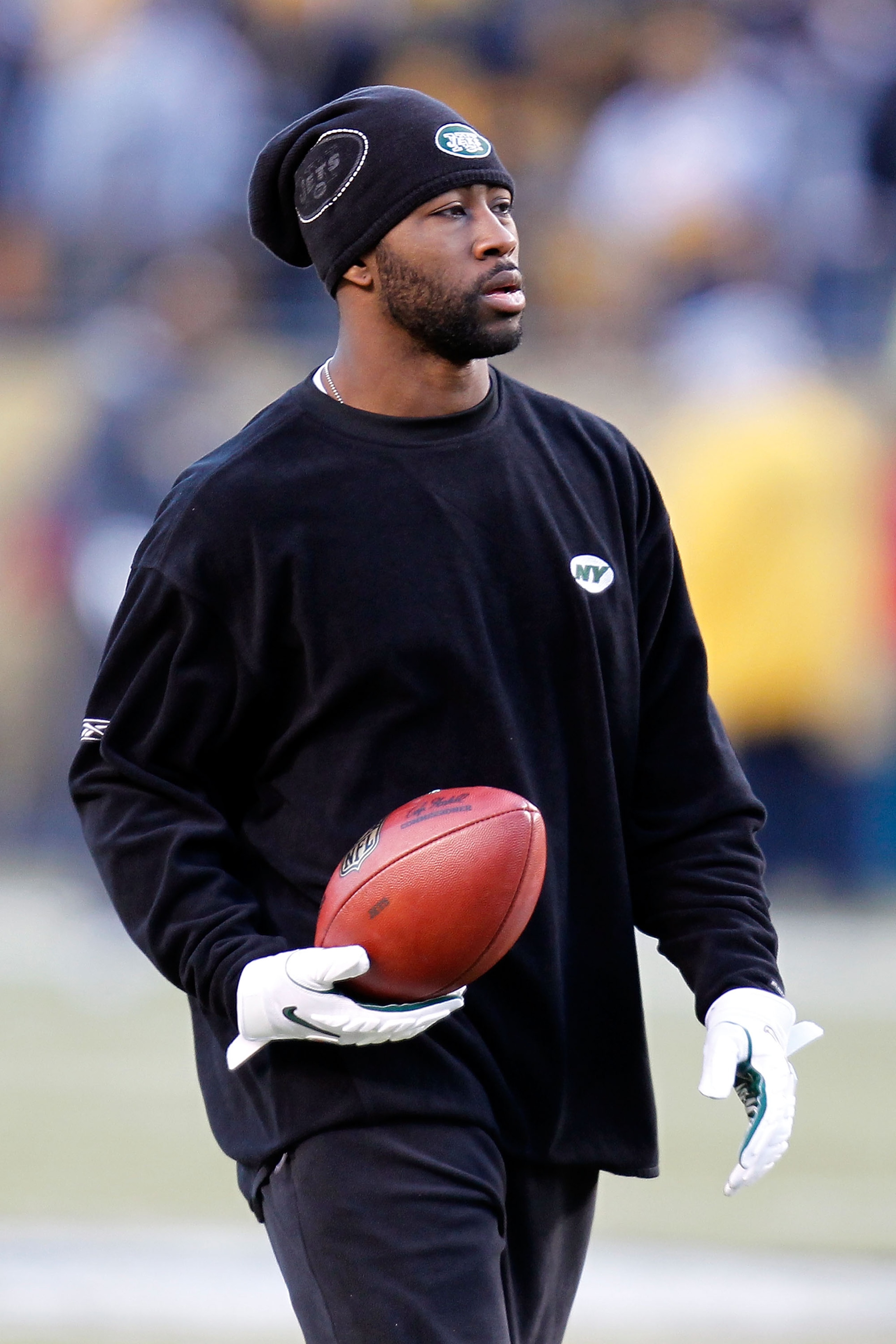 PITTSBURGH, PA - JANUARY 23:  Darrelle Revis #24 of the New York Jets looks on during warm ups against the Pittsburgh Steelers during the 2011 AFC Championship game at Heinz Field on January 23, 2011 in Pittsburgh, Pennsylvania.  (Photo by Gregory Shamus/