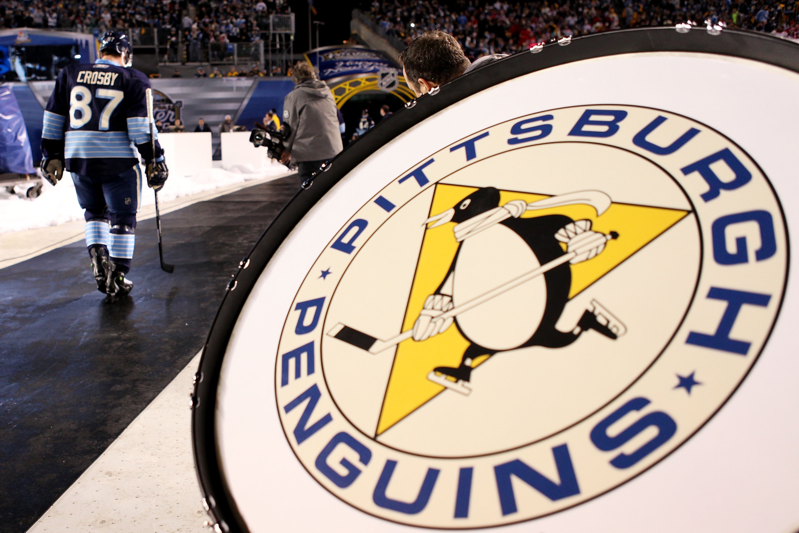 PITTSBURGH, PA - JANUARY 01:  Captain Sidney Crosby #87 of the Pittsburgh Penguins walks out to the ice before playing against the Washington Capitals during the 2011 NHL Bridgestone Winter Classic at Heinz Field on January 1, 2011 in Pittsburgh, Pennsylv