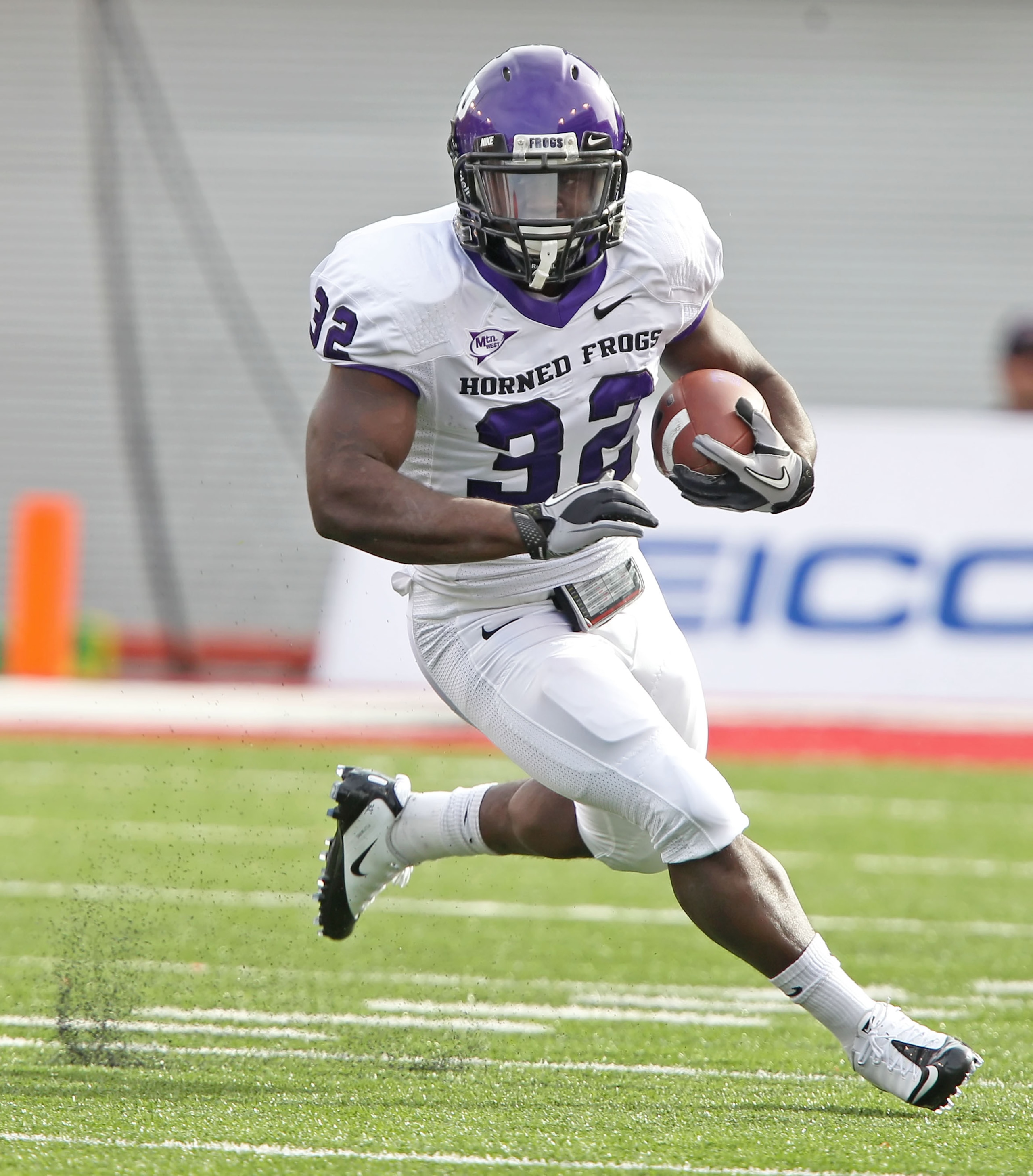 SALT LAKE CITY, UT - NOVEMBER 6: Waymon James #32 of the TCU Horned Frogs runs the ball in a game against the Utah Utes during the first half of an NCAA football game November 6, 2010 at Rice-Eccles Stadium in Salt Lake City, Utah. (Photo by George Frey/G