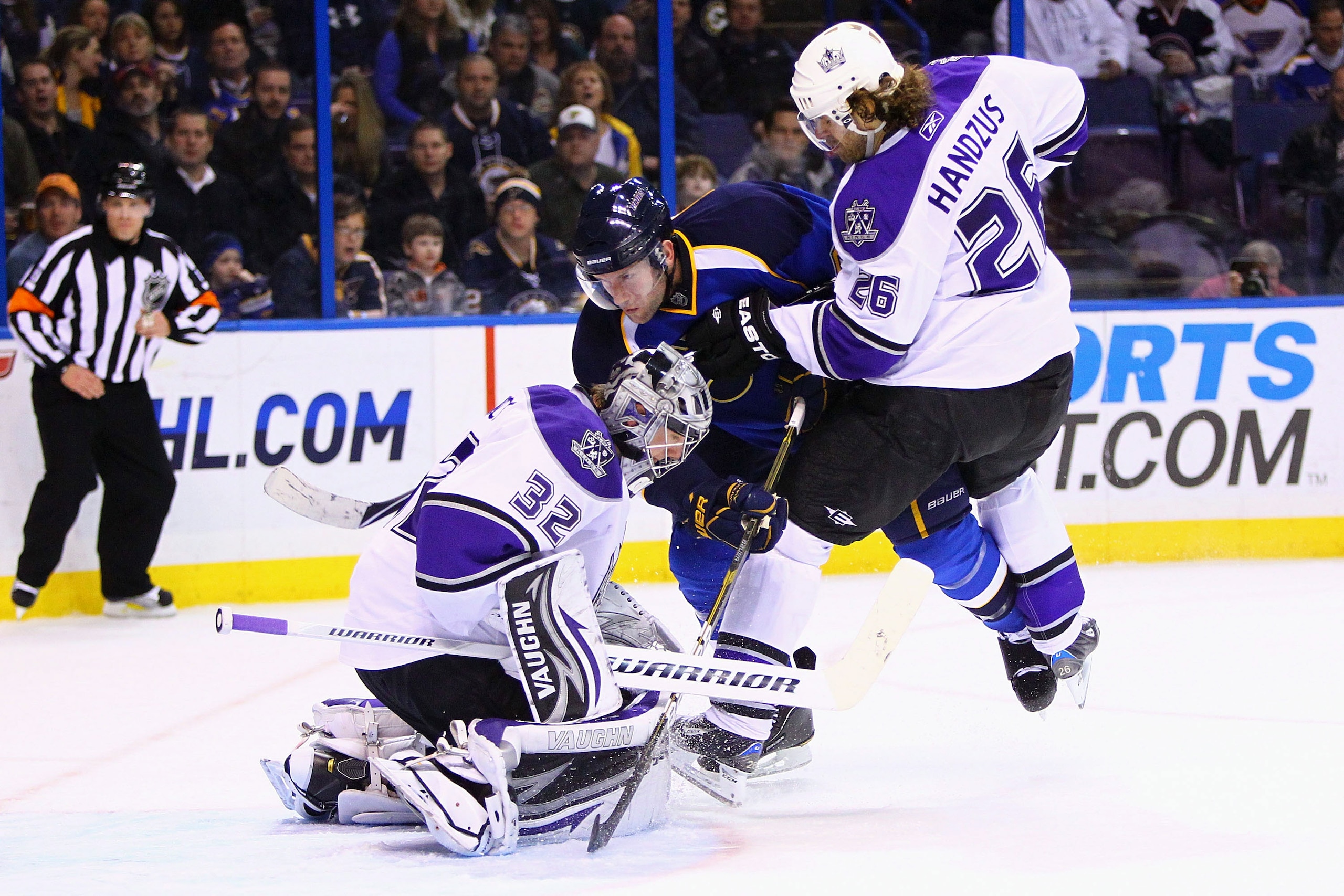 ST. LOUIS, MO - JANUARY 18: David Backes #42 of the St. Louis Blues is pushed into Jonathan Quick #32 of the Los Angeles Kings by Michal Handzus #26 of the Kings at the Scottrade Center on January 18, 2011 in St. Louis, Missouri. (Photo by Dilip Vishwana ST. LOUIS, MO - JANUARY 18: David Backes #42 of the St. Louis Blues is pushed into Jonathan Quick #32 of the Los Angeles Kings by Michal Handzus #26 of the Kings at the Scottrade Center on January 18, 2011 in St. Louis, Missouri. (Photo by Dilip Vishwana