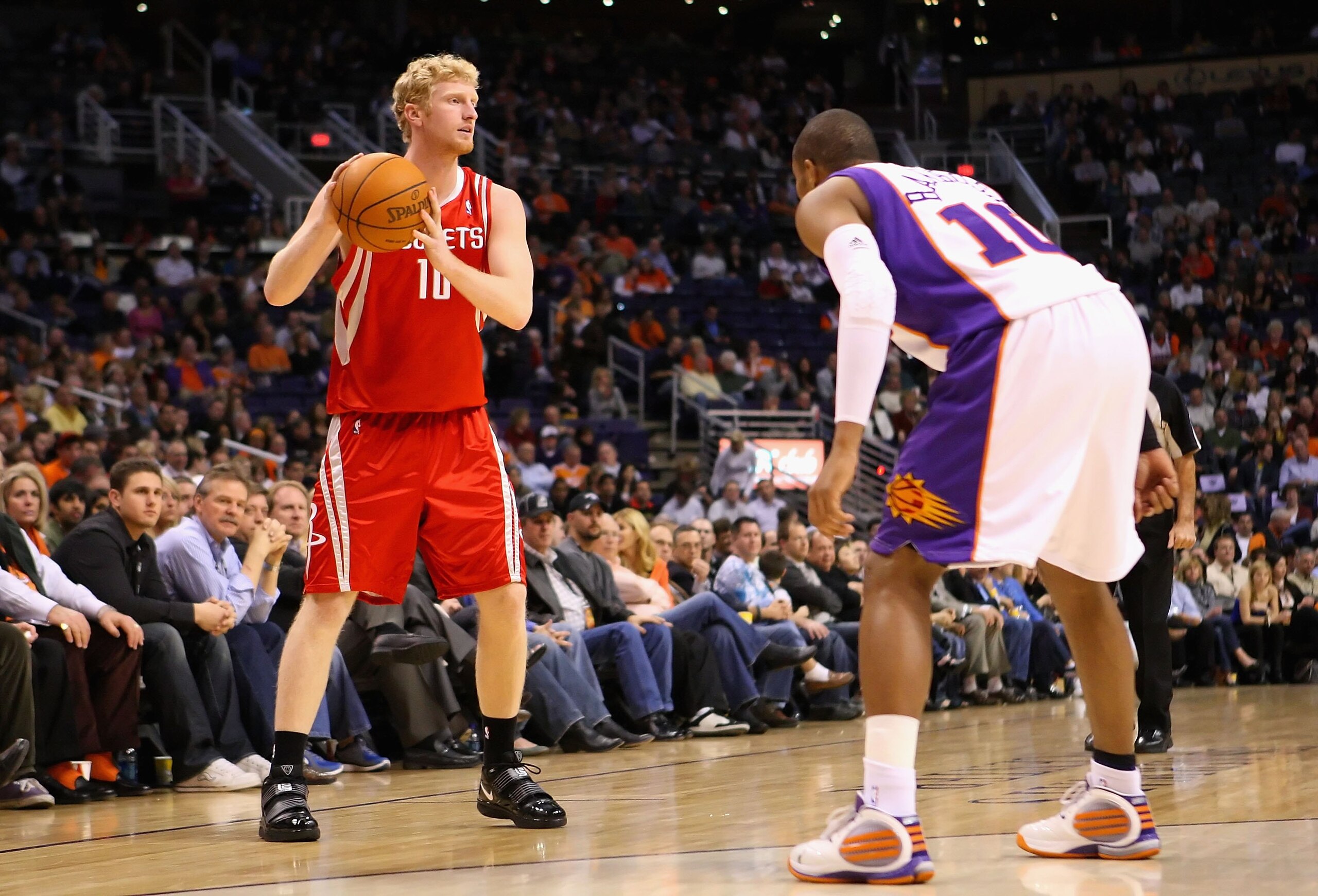 PHOENIX - JANUARY 06: Chase Budinger #10 of the Houston Rockets looks to pass during the NBA game against the Phoenix Suns at US Airways Center on January 6, 2010 in Phoenix, Arizona. The Suns defeated the Rockets 118-110. NOTE TO USER: User expressly a PHOENIX - JANUARY 06: Chase Budinger #10 of the Houston Rockets looks to pass during the NBA game against the Phoenix Suns at US Airways Center on January 6, 2010 in Phoenix, Arizona. The Suns defeated the Rockets 118-110. NOTE TO USER: User expressly a