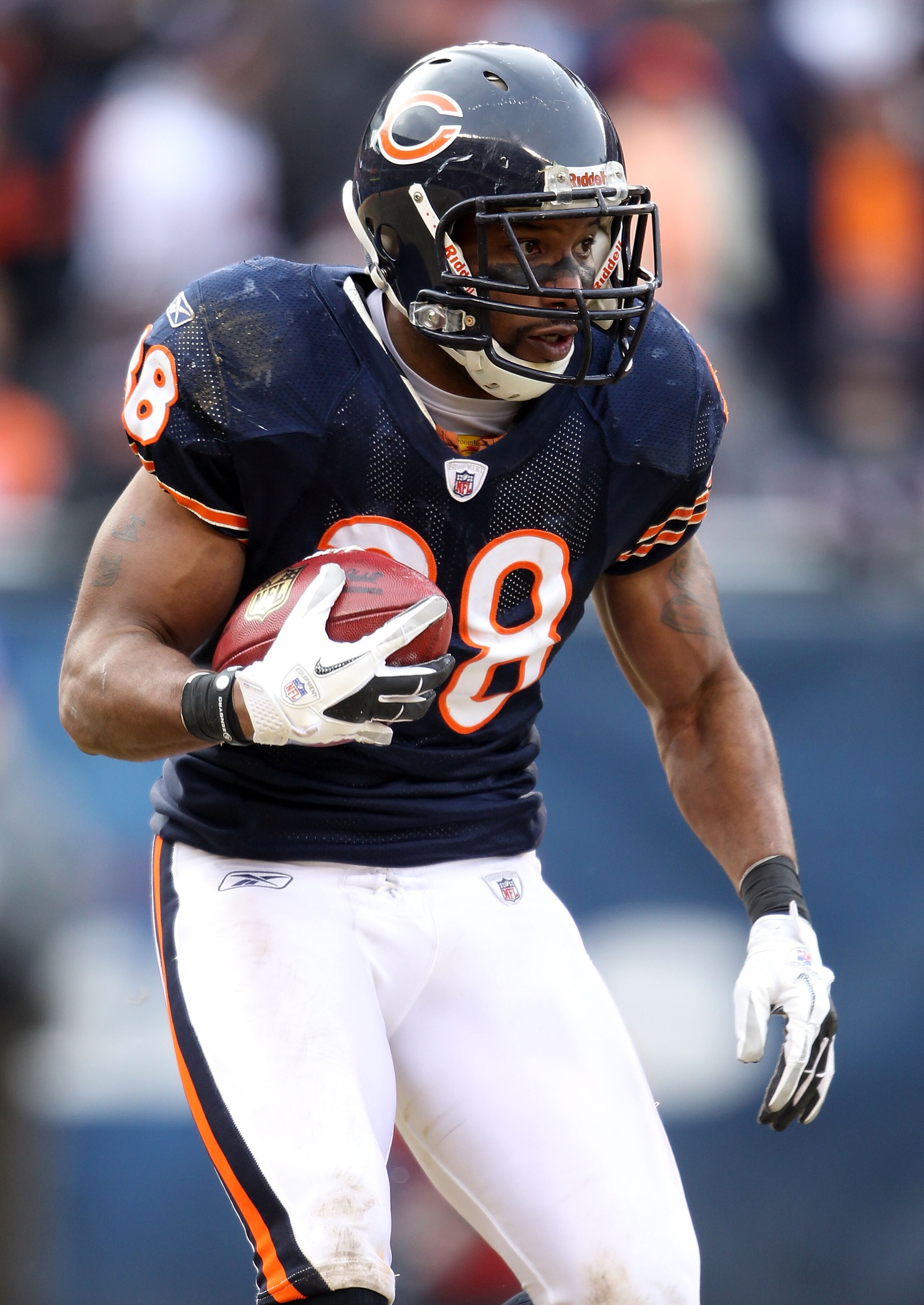 CHICAGO, IL - JANUARY 16:  Danieal Manning #38 of the Chicago Bears with the ball against the Seattle Seahawks in the 2011 NFC divisional playoff game at Soldier Field on January 16, 2011 in Chicago, Illinois.  (Photo by Andy Lyons/Getty Images)