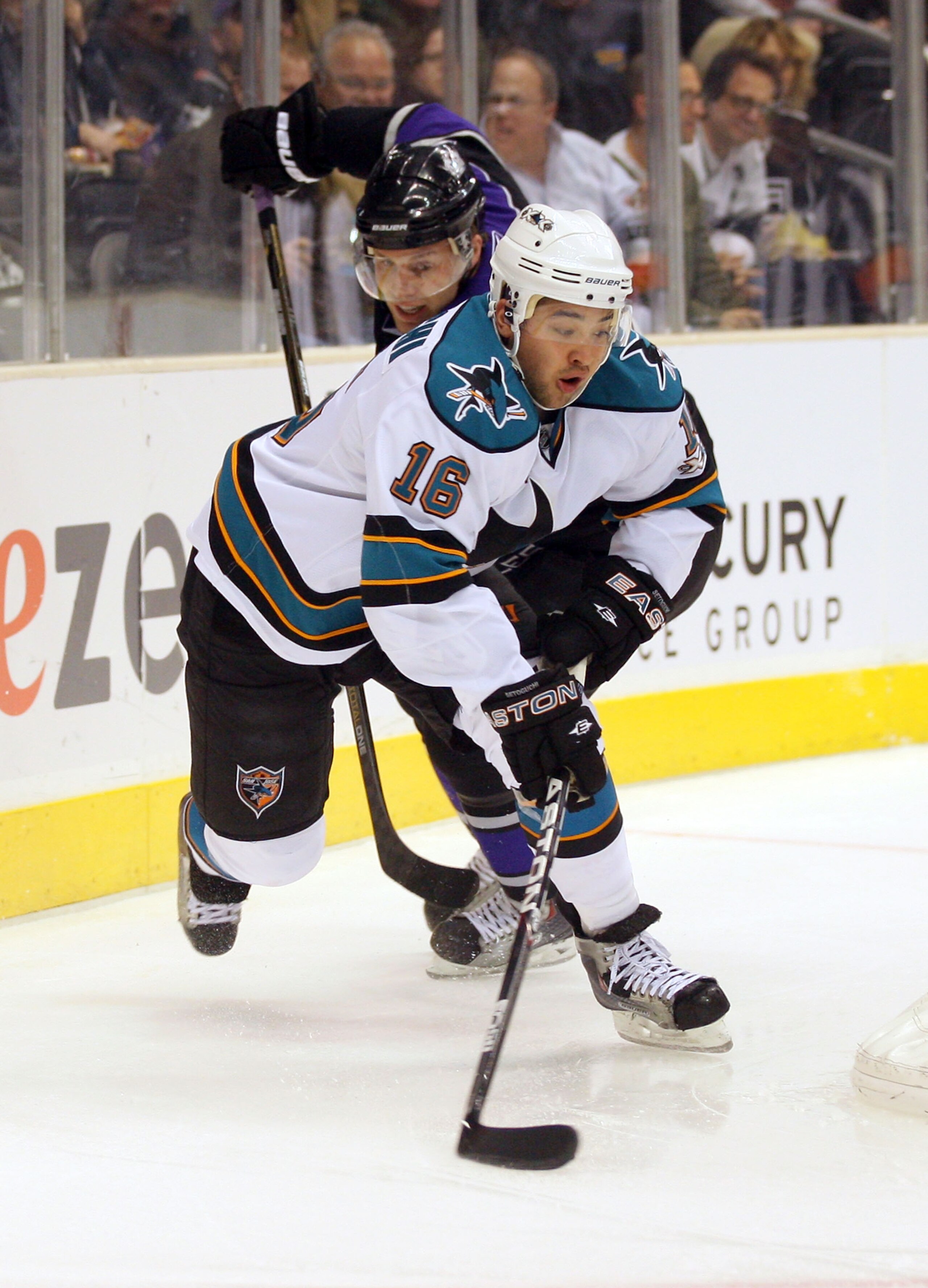 LOS ANGELES, CA - JANUARY 26: Devin Setoguchi #16 of the San Jose Sharks skates around the net away from defenseman Jack Johnson #3 of the Los Angeles Kings at Staples Center on January 26, 2011 in Los Angeles, California. The Kings defeated the Sharks 3 LOS ANGELES, CA - JANUARY 26: Devin Setoguchi #16 of the San Jose Sharks skates around the net away from defenseman Jack Johnson #3 of the Los Angeles Kings at Staples Center on January 26, 2011 in Los Angeles, California. The Kings defeated the Sharks 3