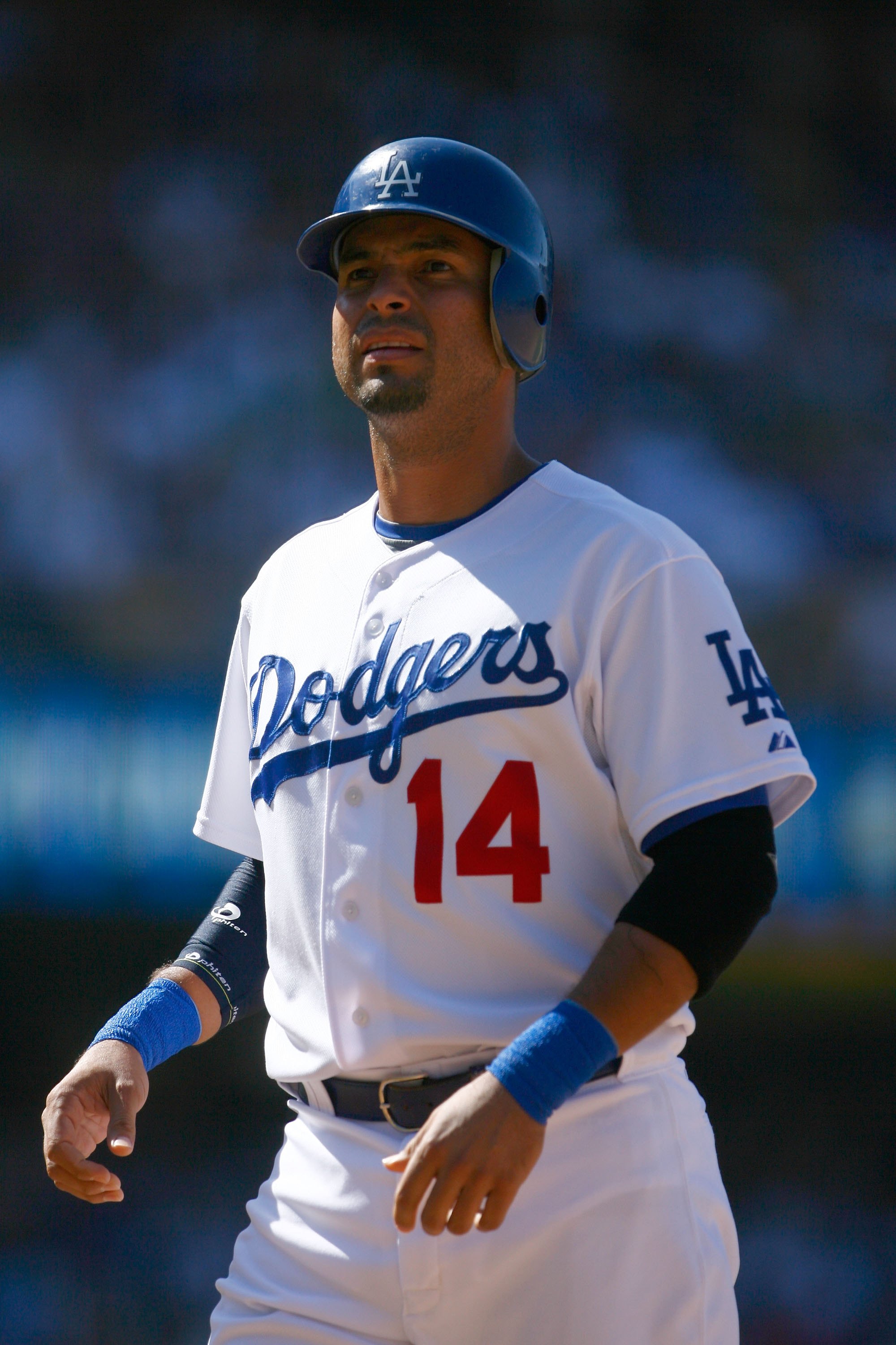 Los Angeles Dodgers' Rod Barajas, below Atlanta Braves second