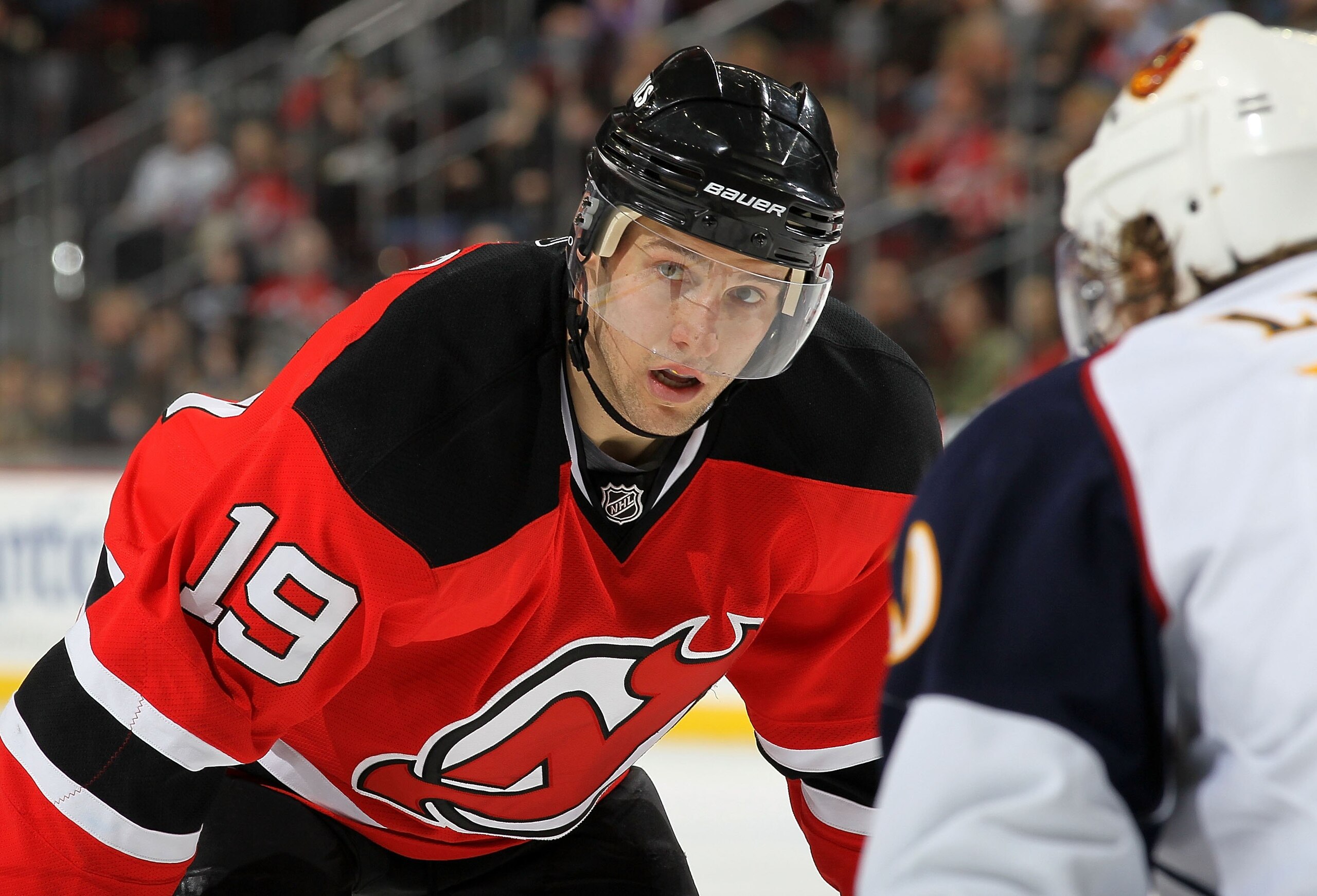 NEWARK, NJ - DECEMBER 31:  Travis Zajac #19 of the New Jersey Devils looks on against the Atlanta Thrashers at the Prudential Center on December 31, 2010 in Newark, New Jersey.  (Photo by Jim McIsaac/Getty Images)