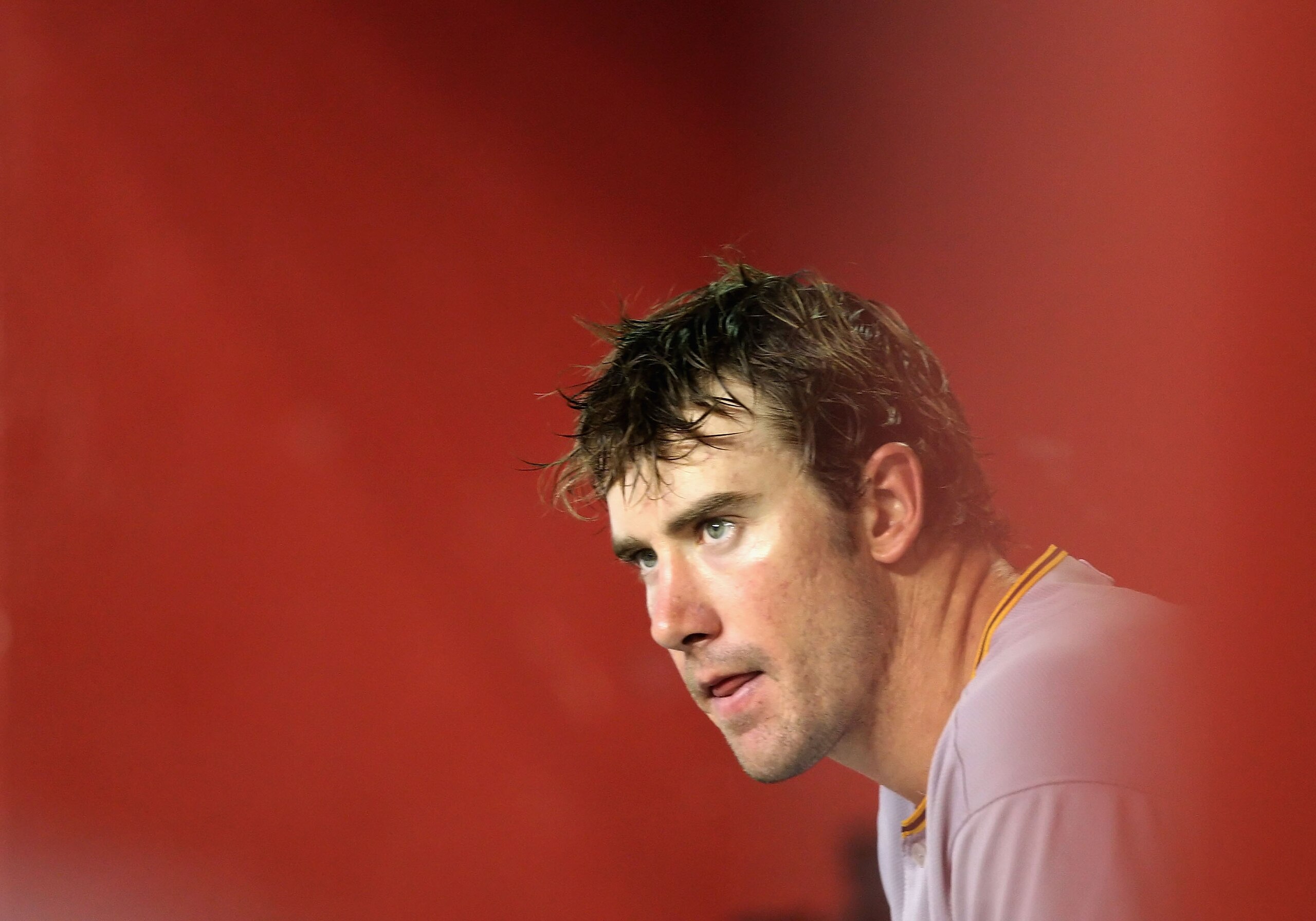 PHOENIX - JULY 25:  Starting pitcher Ross Ohlendorf #49 of the Pittsburgh Pirates watches from the dugout during the major league baseball game against the Arizona Diamondbacks at Chase Field on July 25, 2009 in Phoenix, Arizona.  (Photo by Christian Pete