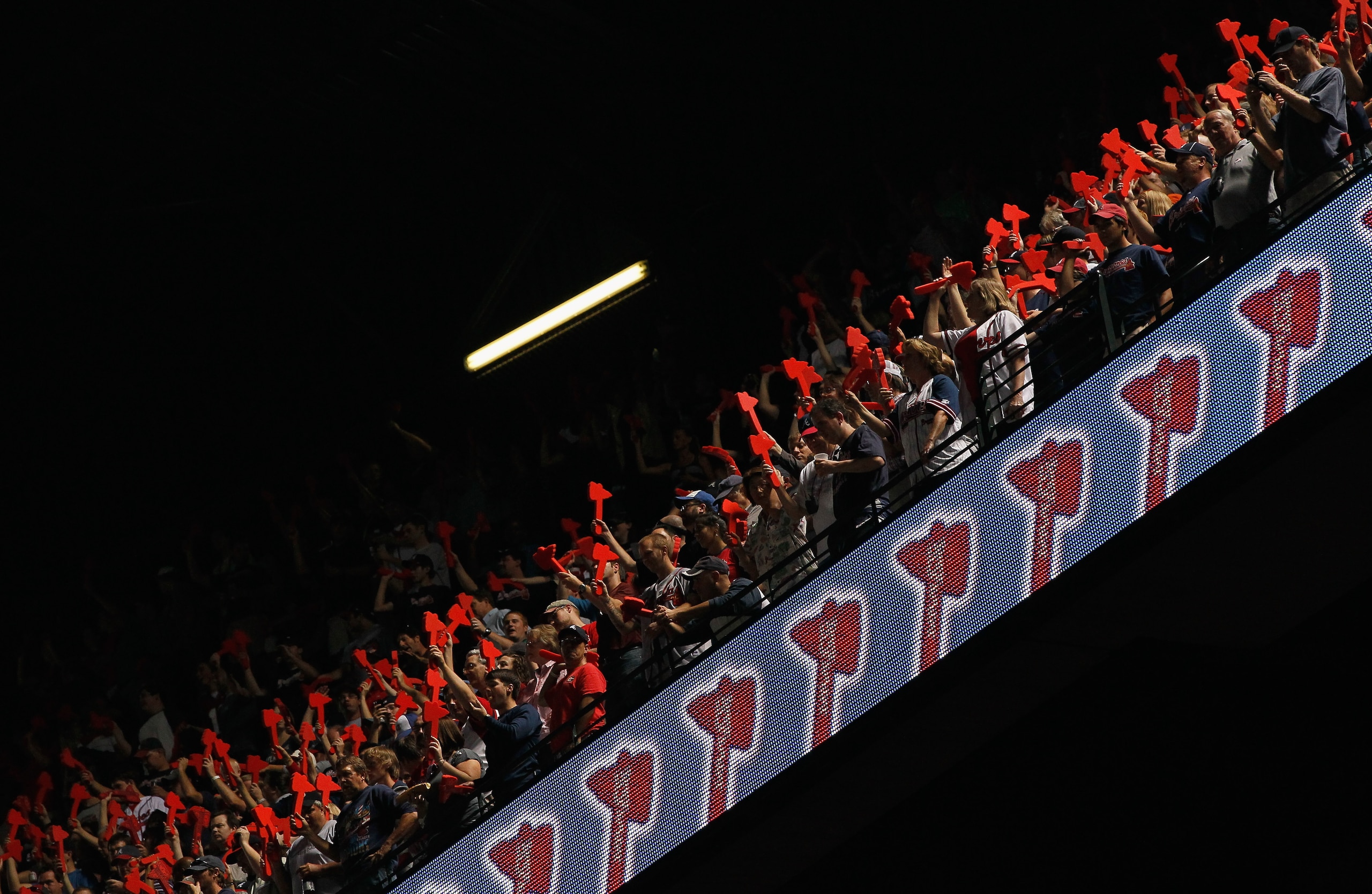 ATLANTA - OCTOBER 11: Fans of the Atlanta Braves cheer against the San Francisco Giants during Game Four of the NLDS of the 2010 MLB Playoffs at Turner Field on October 11, 2010 in Atlanta, Georgia. (Photo by Kevin C. Cox/Getty Images) ATLANTA - OCTOBER 11: Fans of the Atlanta Braves cheer against the San Francisco Giants during Game Four of the NLDS of the 2010 MLB Playoffs at Turner Field on October 11, 2010 in Atlanta, Georgia. (Photo by Kevin C. Cox/Getty Images)