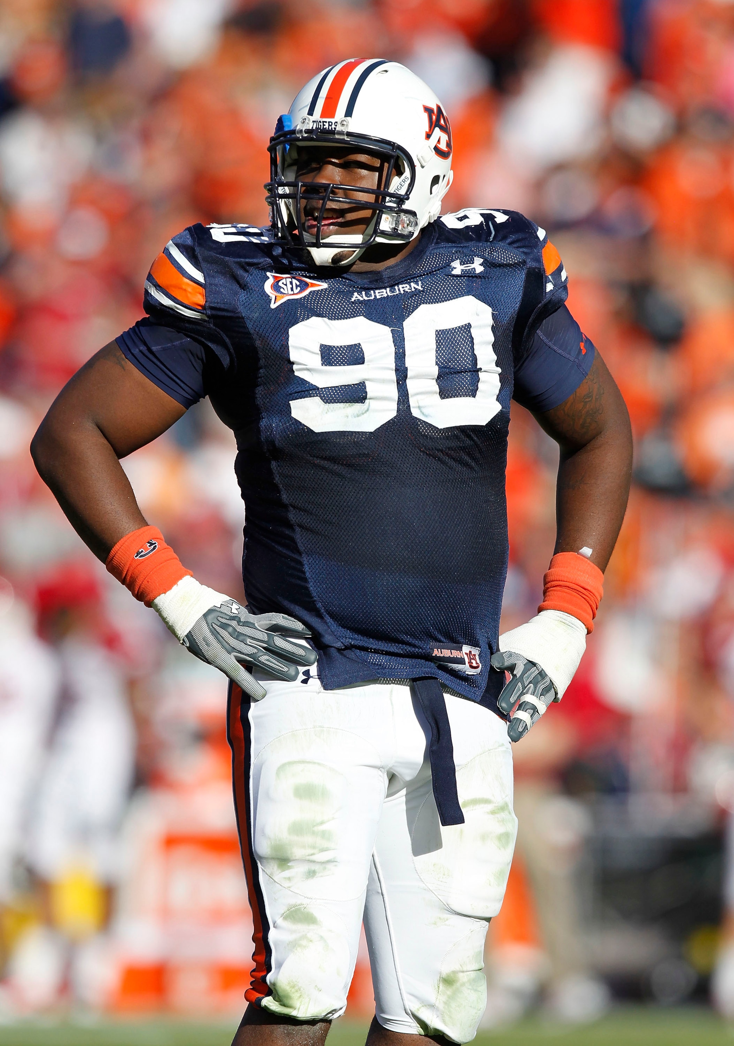 AUBURN - OCTOBER 16: Defensive lineman Nick Fairley #90 of the Auburn Tigers takes a break on the field during the game against the Arkansas Razorbacks at Jordan-Hare Stadium on October 16, 2010 in Auburn, Alabama. (Photo by Mike Zarrilli/Getty Images) AUBURN - OCTOBER 16: Defensive lineman Nick Fairley #90 of the Auburn Tigers takes a break on the field during the game against the Arkansas Razorbacks at Jordan-Hare Stadium on October 16, 2010 in Auburn, Alabama. (Photo by Mike Zarrilli/Getty Images)