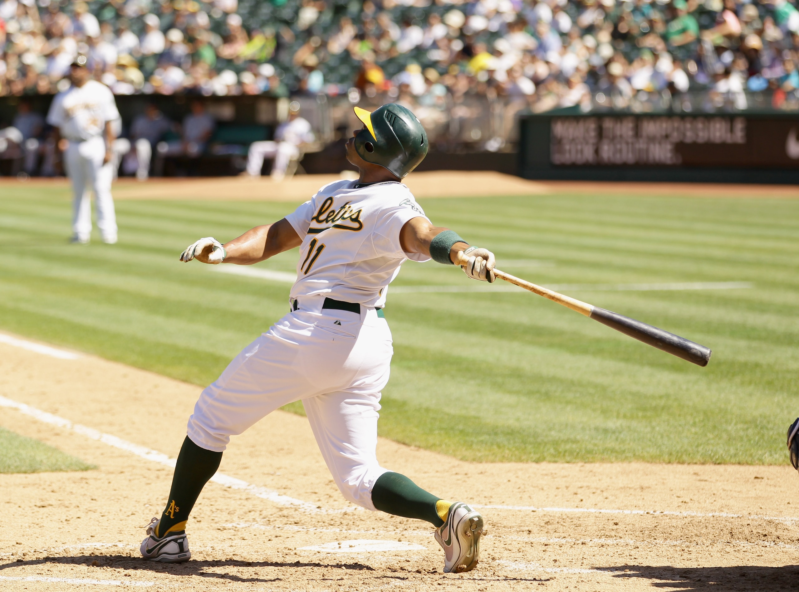 OAKLAND, CA - SEPTEMBER 06: Rajai Davis #11 of the Oakland Athletics hits a sac fly that scored Jack Cust during their game against the Seattle Mariners at the Oakland-Alameda County Coliseum on September 6, 2010 in Oakland, California. (Photo by Ezra S OAKLAND, CA - SEPTEMBER 06: Rajai Davis #11 of the Oakland Athletics hits a sac fly that scored Jack Cust during their game against the Seattle Mariners at the Oakland-Alameda County Coliseum on September 6, 2010 in Oakland, California. (Photo by Ezra S