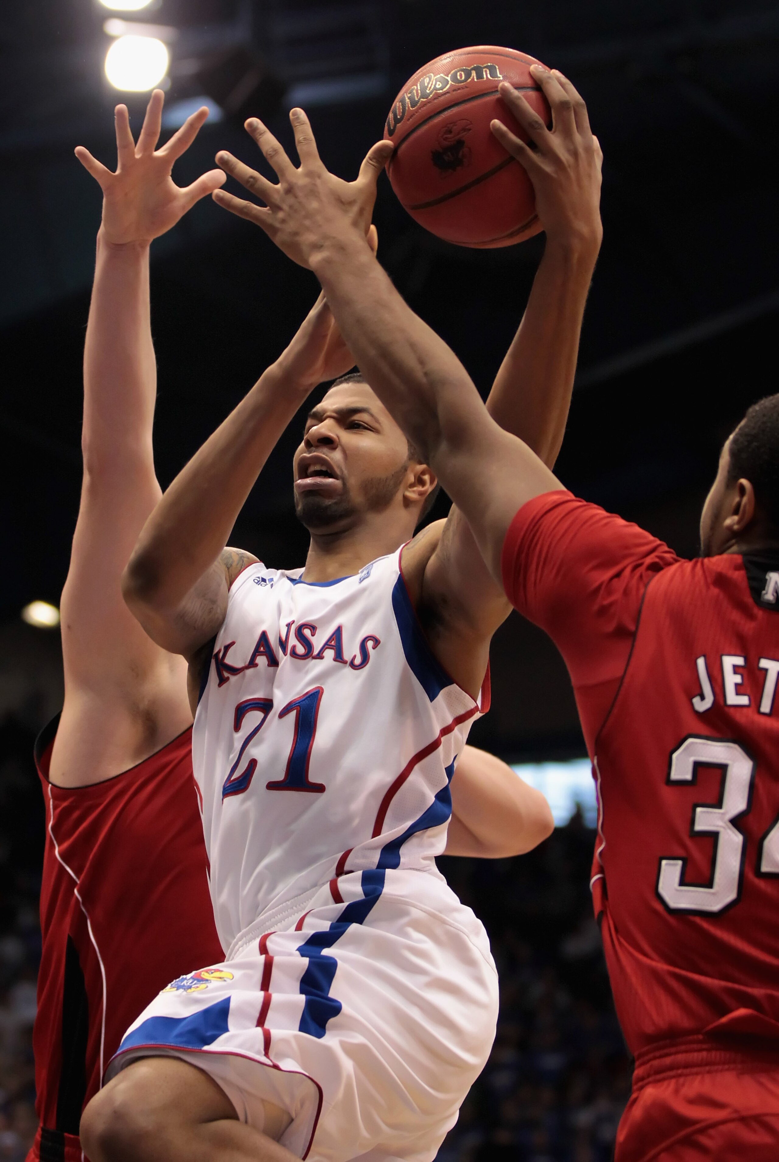 LAWRENCE, KS - JANUARY 15:  Markieff Morris #21 of the Kansas Jayhawks drives against the Nebraska Cornhuskers during the game on January 15, 2011 at Allen Fieldhouse in Lawrence, Kansas.  (Photo by Jamie Squire/Getty Images)