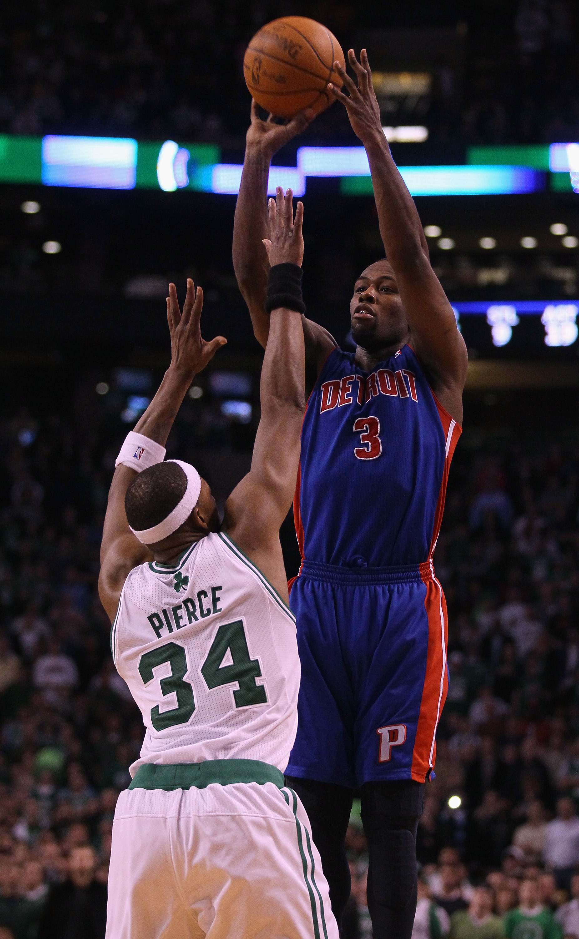 BOSTON, MA - JANUARY 19:  Rodney Stuckey #3 of the Detroit Pistons takes a shot over Paul Pierce #34 of the Boston Celtics on January 19, 2011 at the TD Garden in Boston, Massachusetts. The Celtics defeated the Pistons 86-82. NOTE TO USER: User expressly
