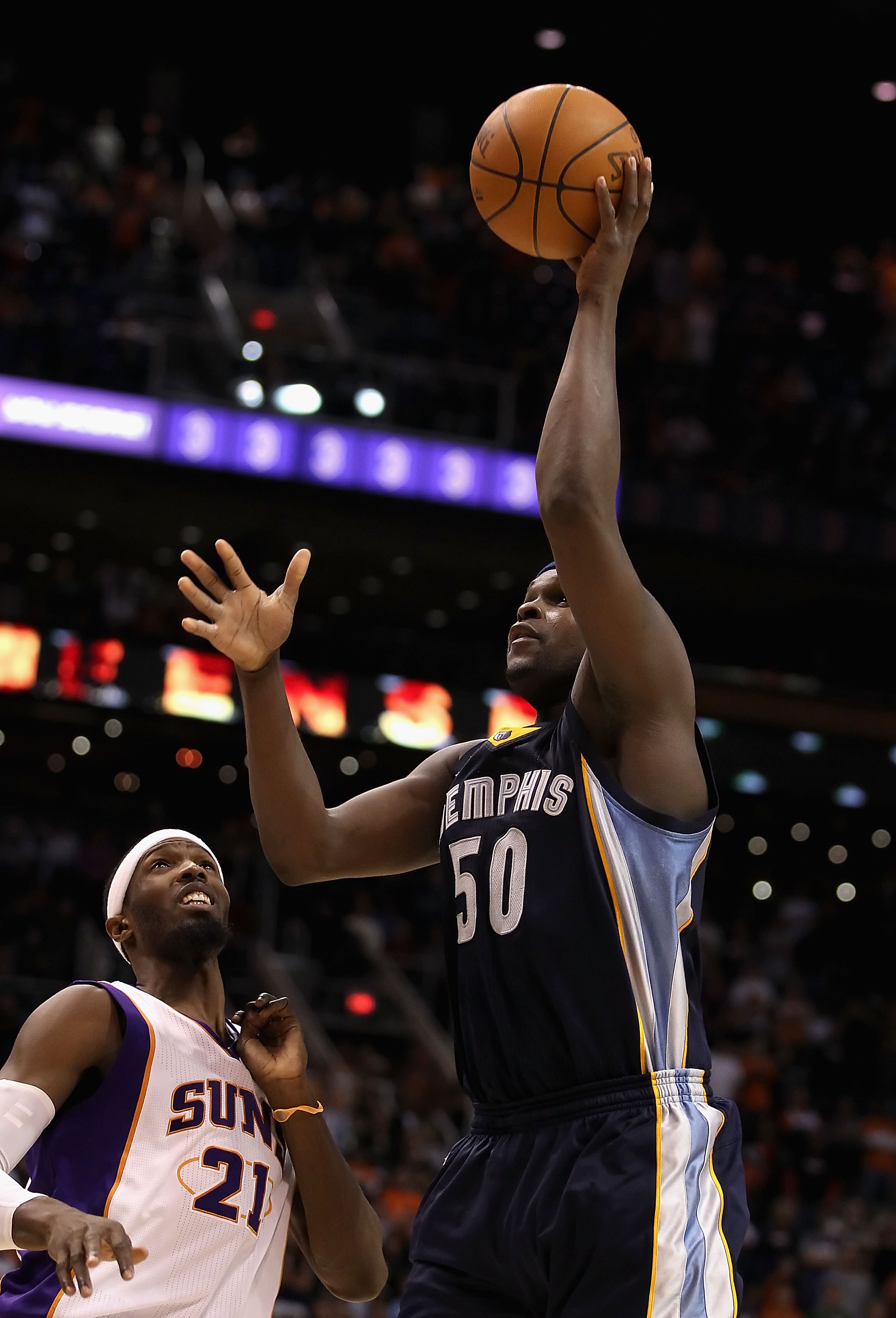 PHOENIX - DECEMBER 08:  Zach Randolph #50 of the Memphis Grizzlies puts up a shot against the Phoenix Suns during the NBA game at US Airways Center on December 8, 2010 in Phoenix, Arizona. NOTE TO USER: User expressly acknowledges and agrees that, by down