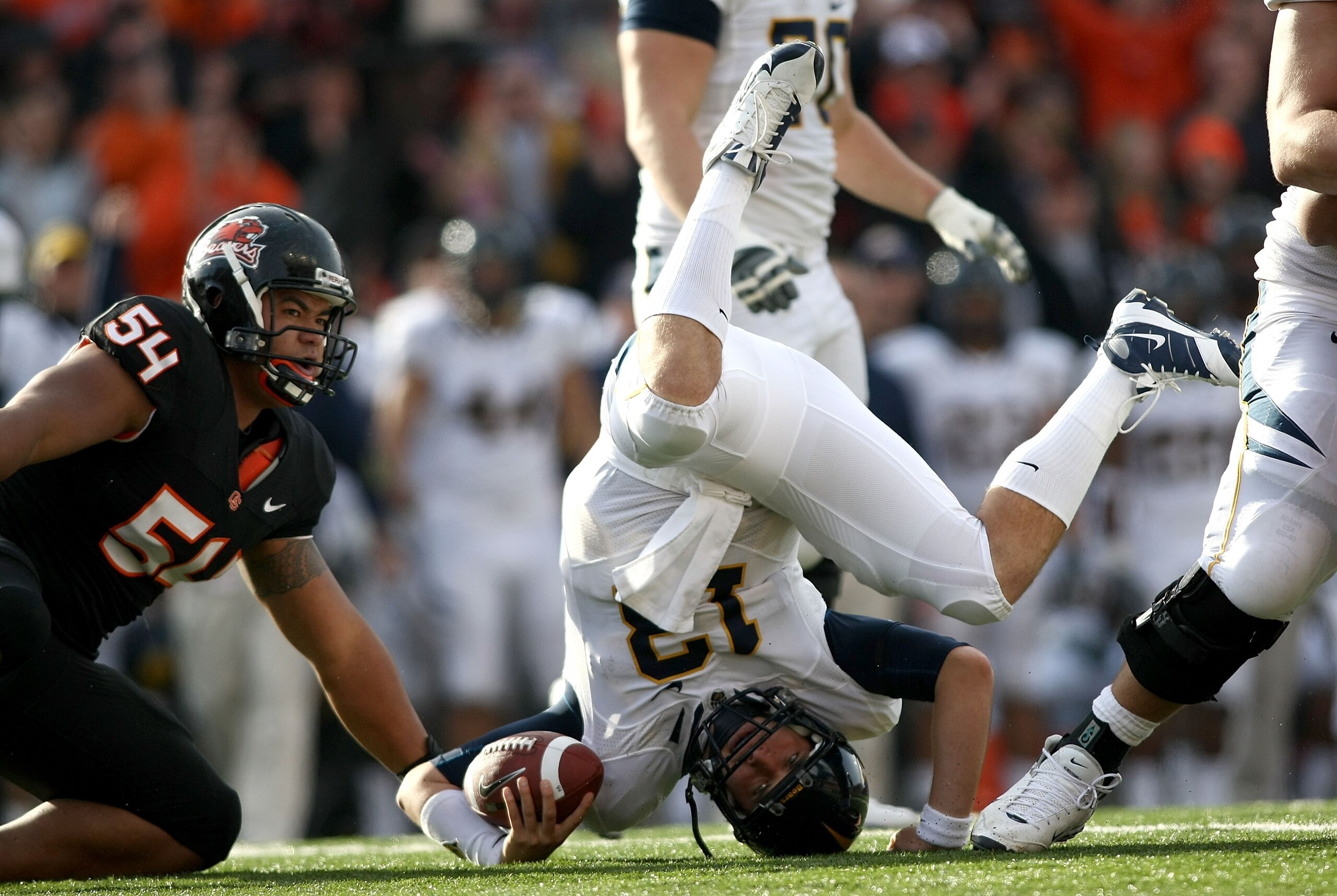 CORVALLIS, OR - NOVEMBER 15: Quarterback Kevin Riley #13 of the California Golden Bears rolls on his head after being sacked by Stephen Paea #54 the Oregon State Beavers at Reser Stadium on November 15, 2008 in Corvalis, Oregon. (Photo by Jonathan Ferre CORVALLIS, OR - NOVEMBER 15: Quarterback Kevin Riley #13 of the California Golden Bears rolls on his head after being sacked by Stephen Paea #54 the Oregon State Beavers at Reser Stadium on November 15, 2008 in Corvalis, Oregon. (Photo by Jonathan Ferre