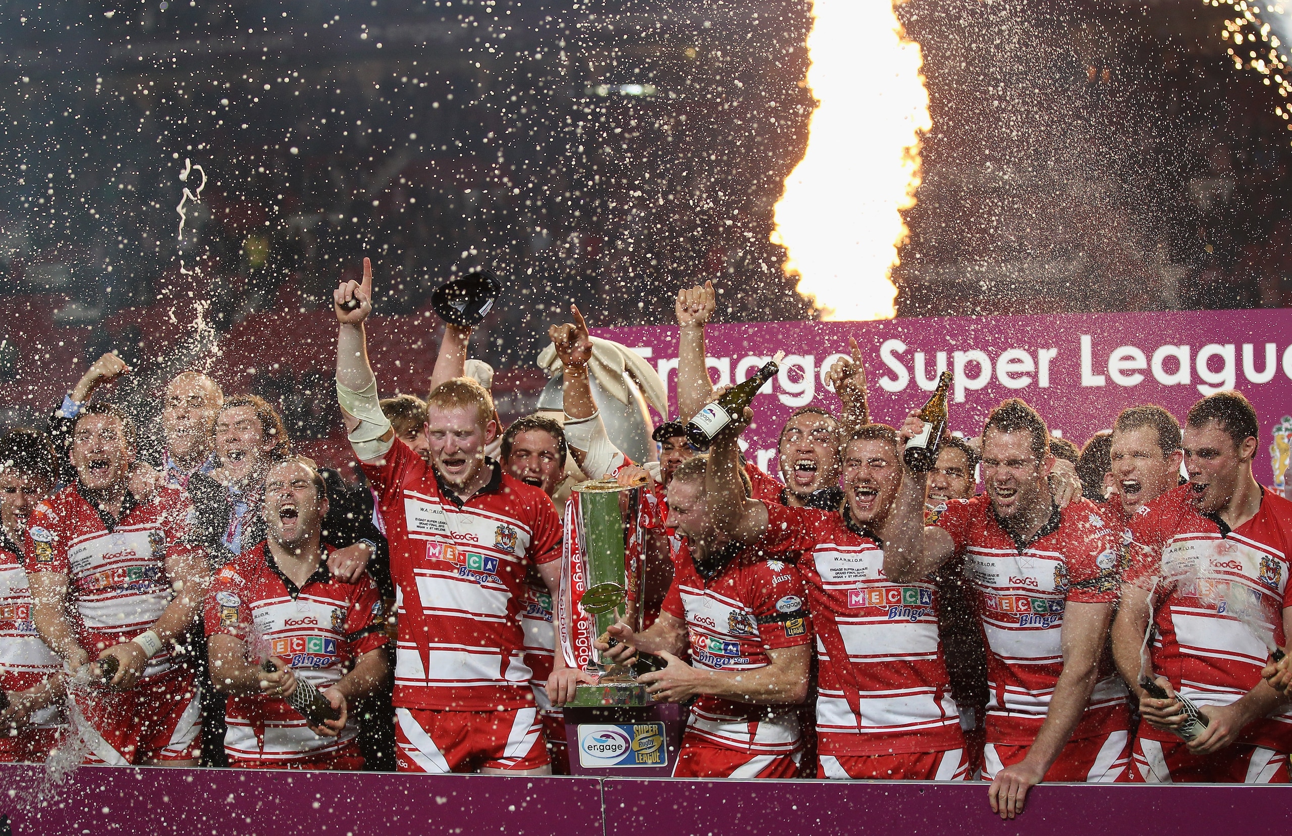 MANCHESTER, ENGLAND - OCTOBER 02:  The players of Wigan Warriors celebrate victory over St Helens in the engage Super League Grand Final between St Helens and Wigan Warriors at Old Trafford on October 2, 2010 in Manchester, England.  (Photo by Alex Livese