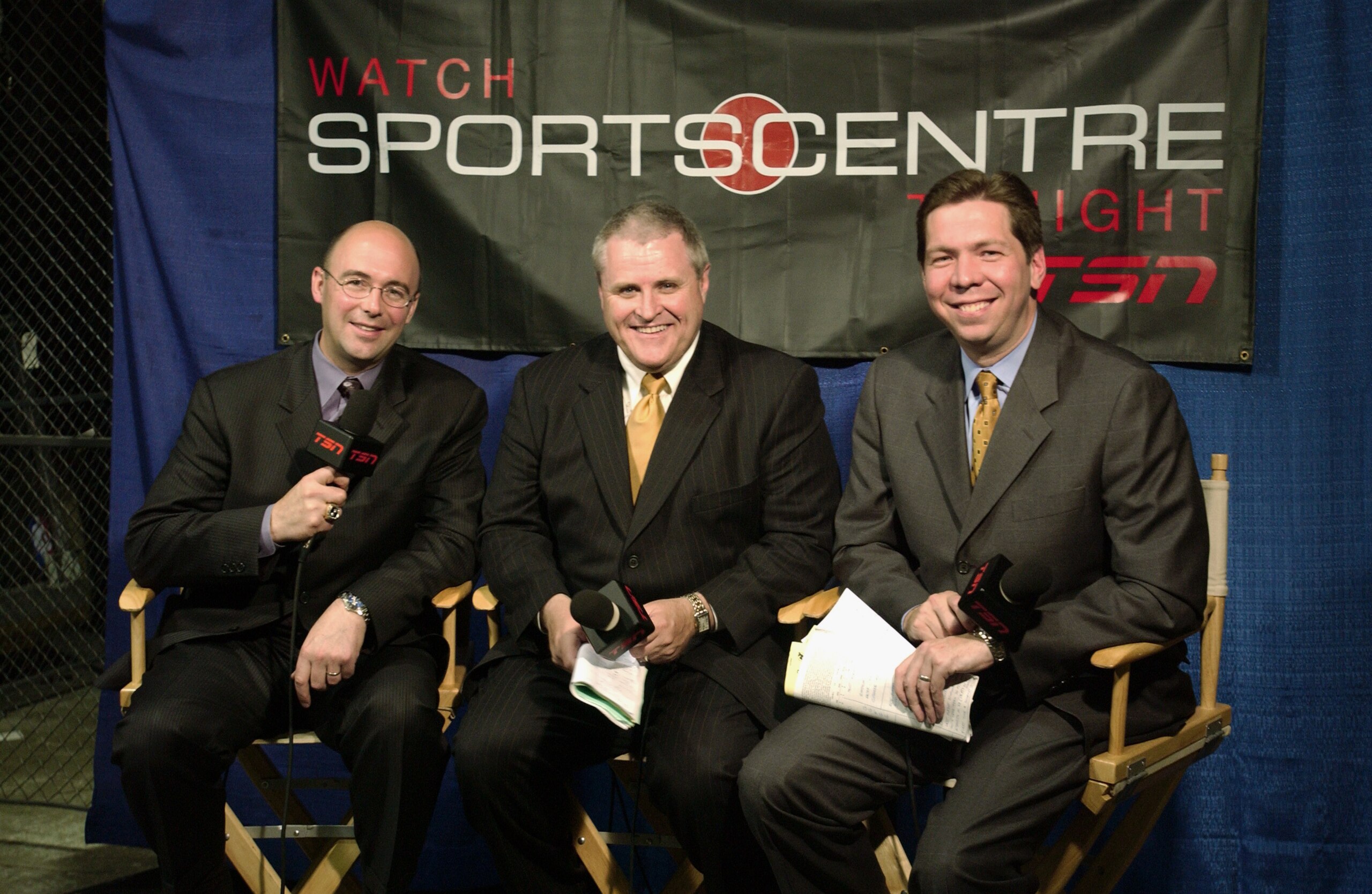 EAST RUTHERFORD, NJ - JUNE 9:  TSN reporters (L-R) Pierre McGuire, Bob McKenzie and Gord Miller during game seven of the 2003 Stanley Cup Finals between the New Jersey Devils and the Mighty Ducks of Anaheim at Continental Airlines Arena on June 9, 2003 in