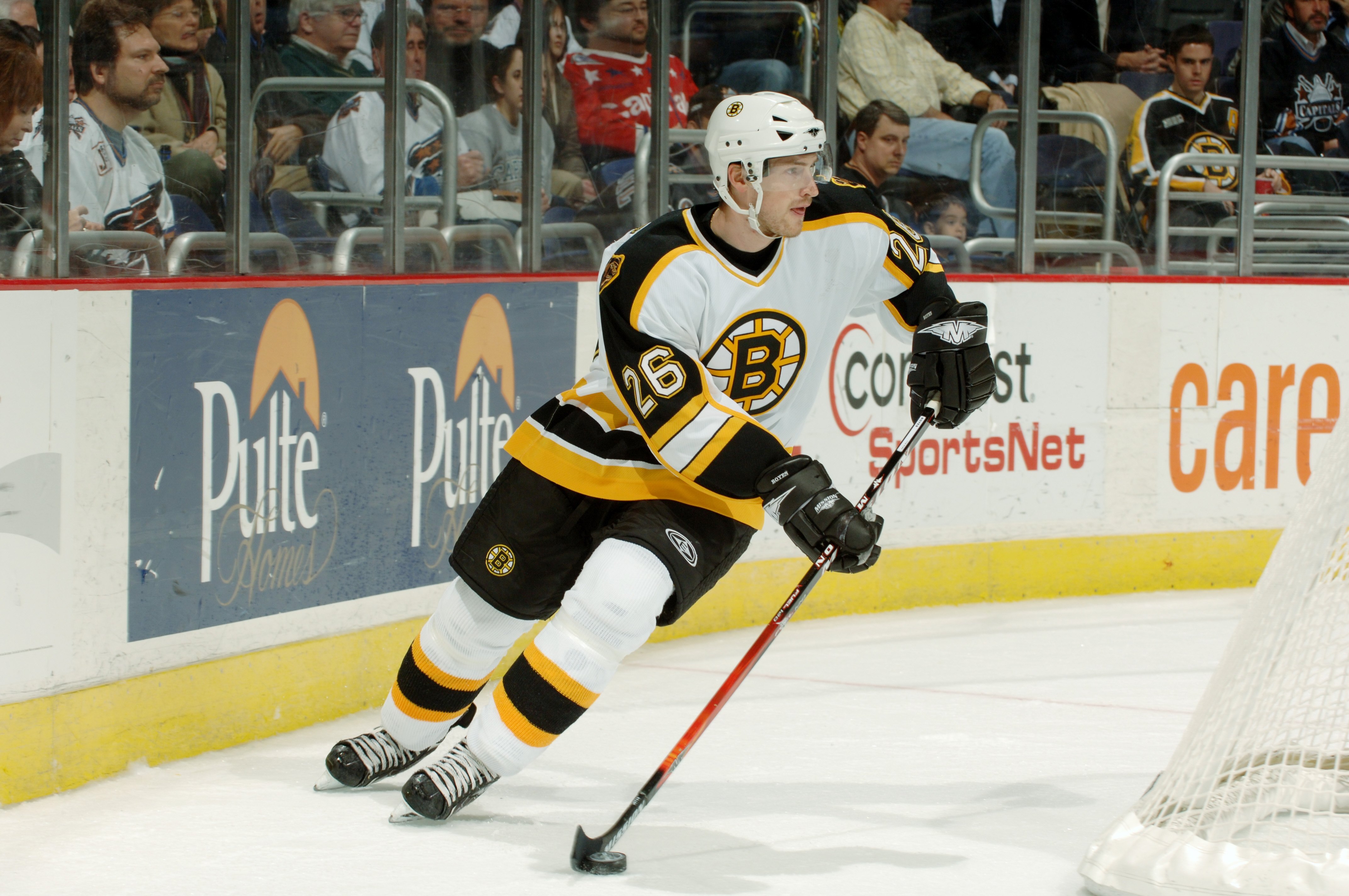 WASHINGTON - NOVEMBER 15:  Brad Boyes #26 of the Boston Bruins skates with puck during a NHL hockey game against the Washington Capitals at the Verizon Center November 15, 2006 in Washington, DC.  (Photo by Mitchell Layton/Getty Images)