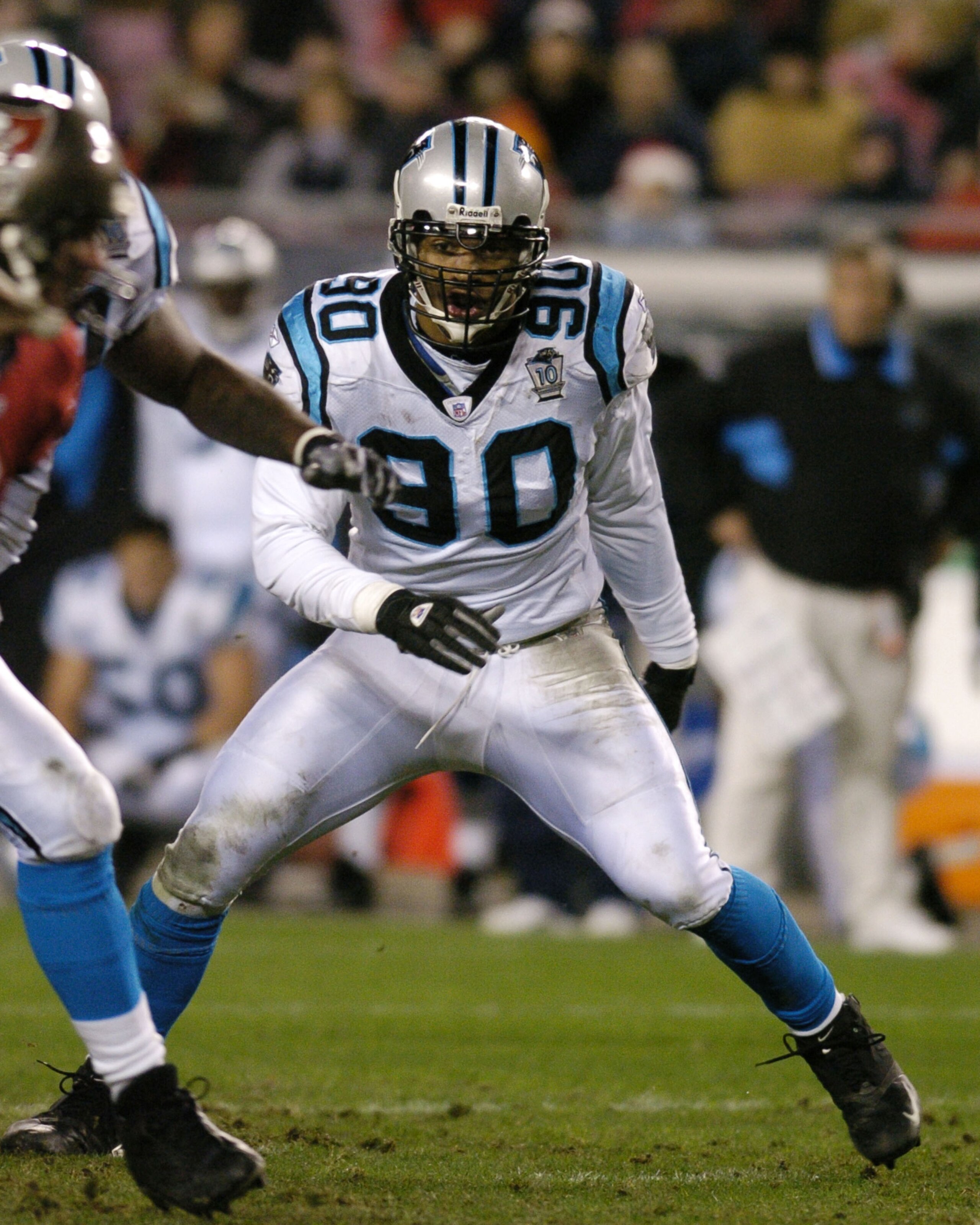 Carolina Panthers defensive end Julius Peppers sets for play  against the Tampa Bay Buccaneers Dec. 26, 2004 at Raymond James Stadium in Tampa.  The Panthers defeated the Bucs 37 to 20.  (Photo by Al Messerschmidt/Getty Images)