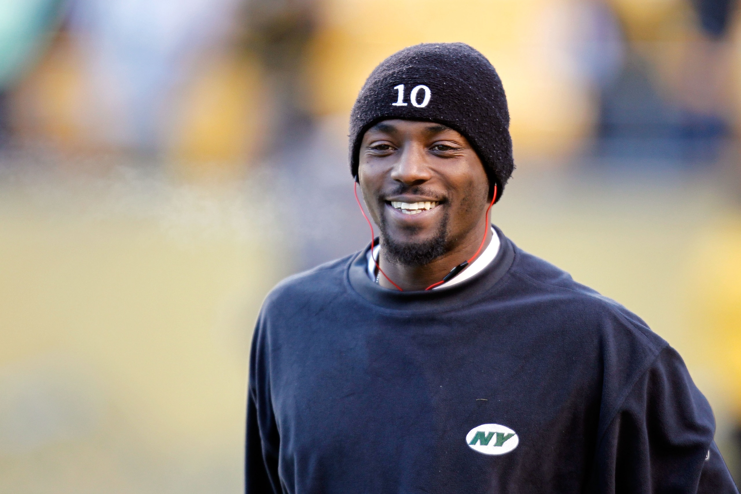 PITTSBURGH, PA - JANUARY 23:  Santonio Holmes #10 of the New York Jets looks on during warm ups against the Pittsburgh Steelers uring the 2011 AFC Championship game at Heinz Field on January 23, 2011 in Pittsburgh, Pennsylvania.  (Photo by Gregory Shamus/