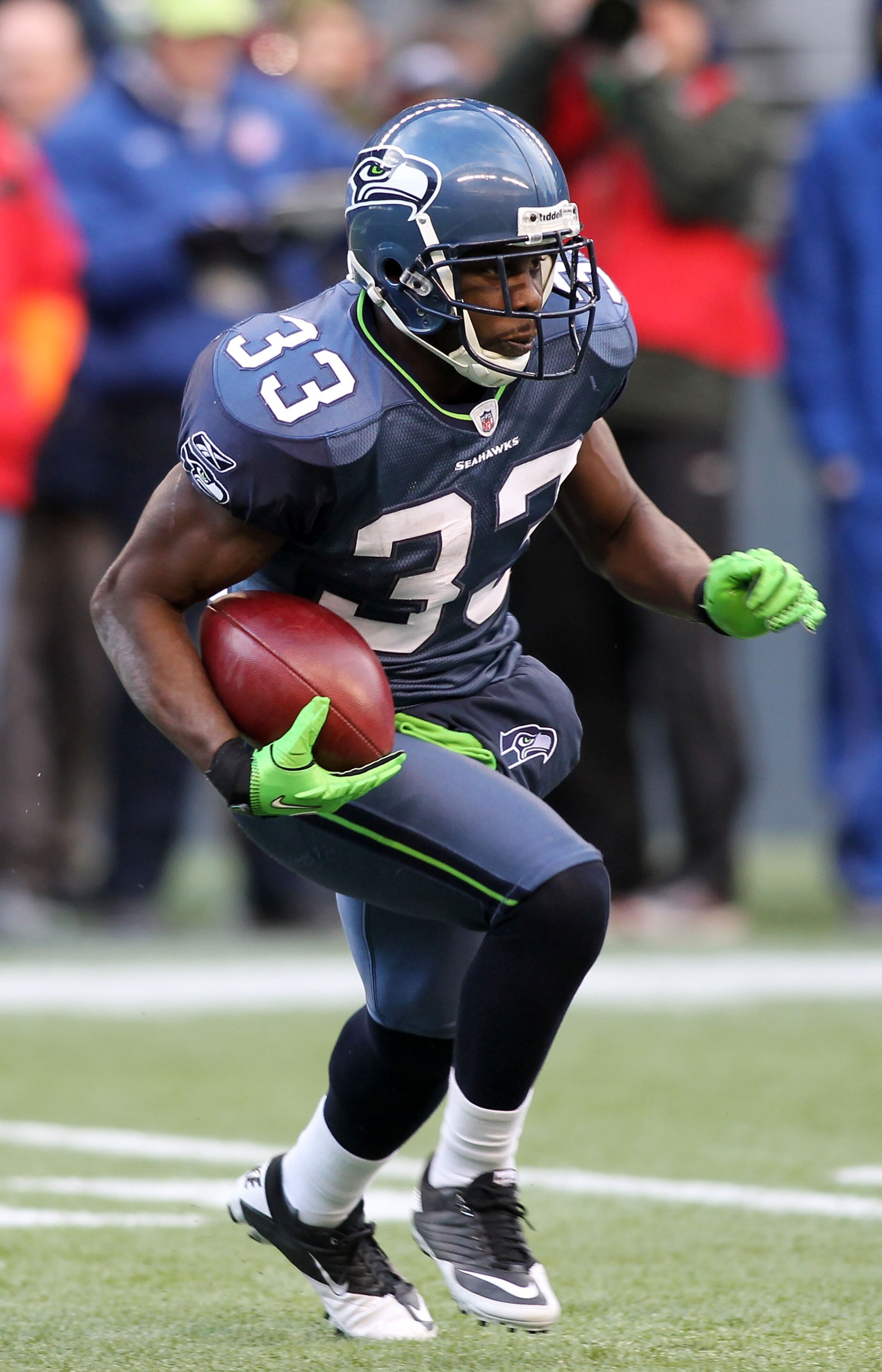 SEATTLE, WA - JANUARY 08: Leon Washington #33 of the Seattle Seahawks runs down field against the New Orleans Saints during the 2011 NFC wild-card playoff game at Qwest Field on January 8, 2011 in Seattle, Washington. (Photo by Jonathan Ferrey/Getty Ima SEATTLE, WA - JANUARY 08: Leon Washington #33 of the Seattle Seahawks runs down field against the New Orleans Saints during the 2011 NFC wild-card playoff game at Qwest Field on January 8, 2011 in Seattle, Washington. (Photo by Jonathan Ferrey/Getty Ima