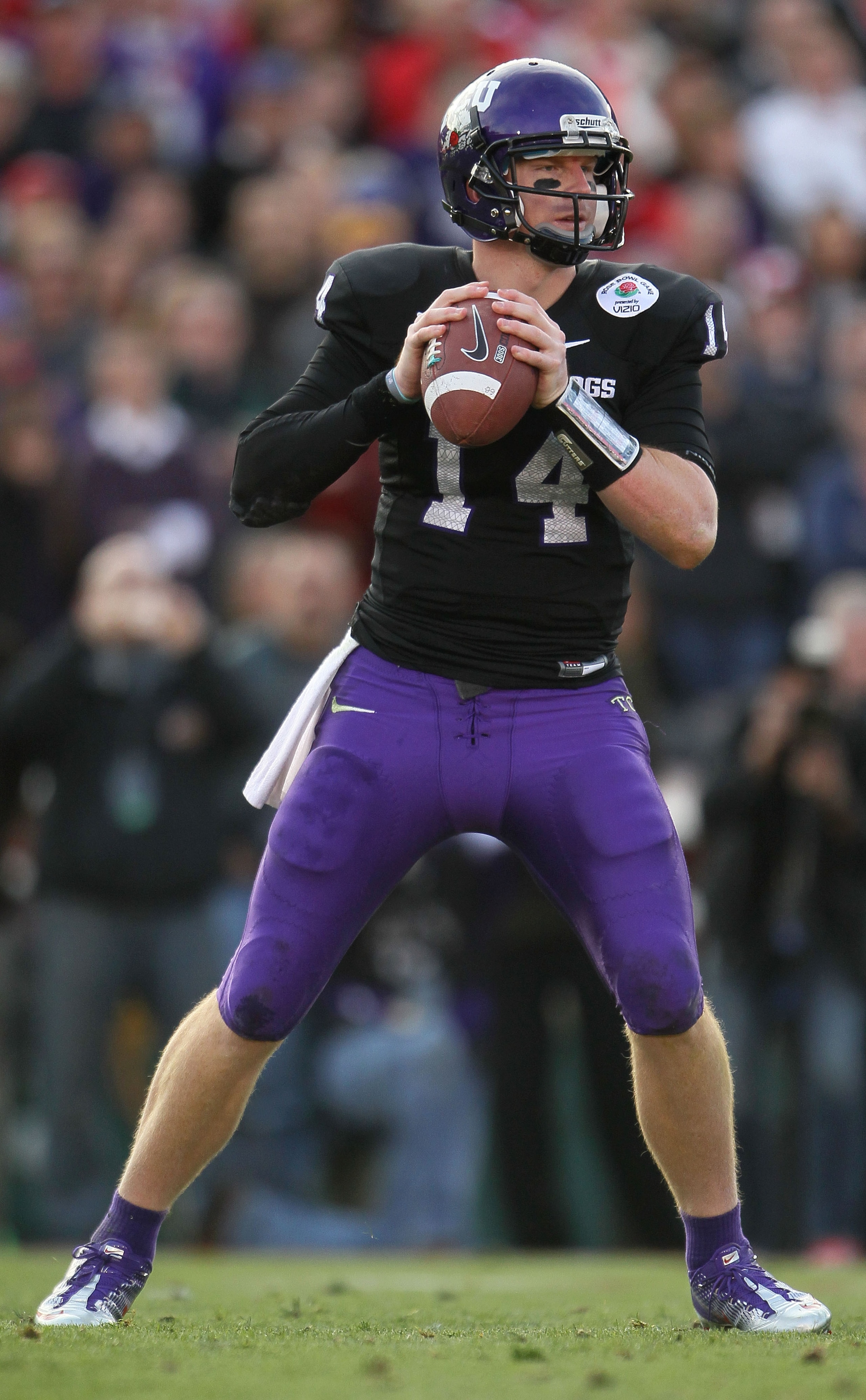 PASADENA, CA - JANUARY 01:  Quarterback Andy Dalton #14 of the TCU Horned Frogs looks to pass against the Wisconsin Badgers in the 97th Rose Bowl game on January 1, 2011 in Pasadena, California.  (Photo by Jeff Gross/Getty Images)
