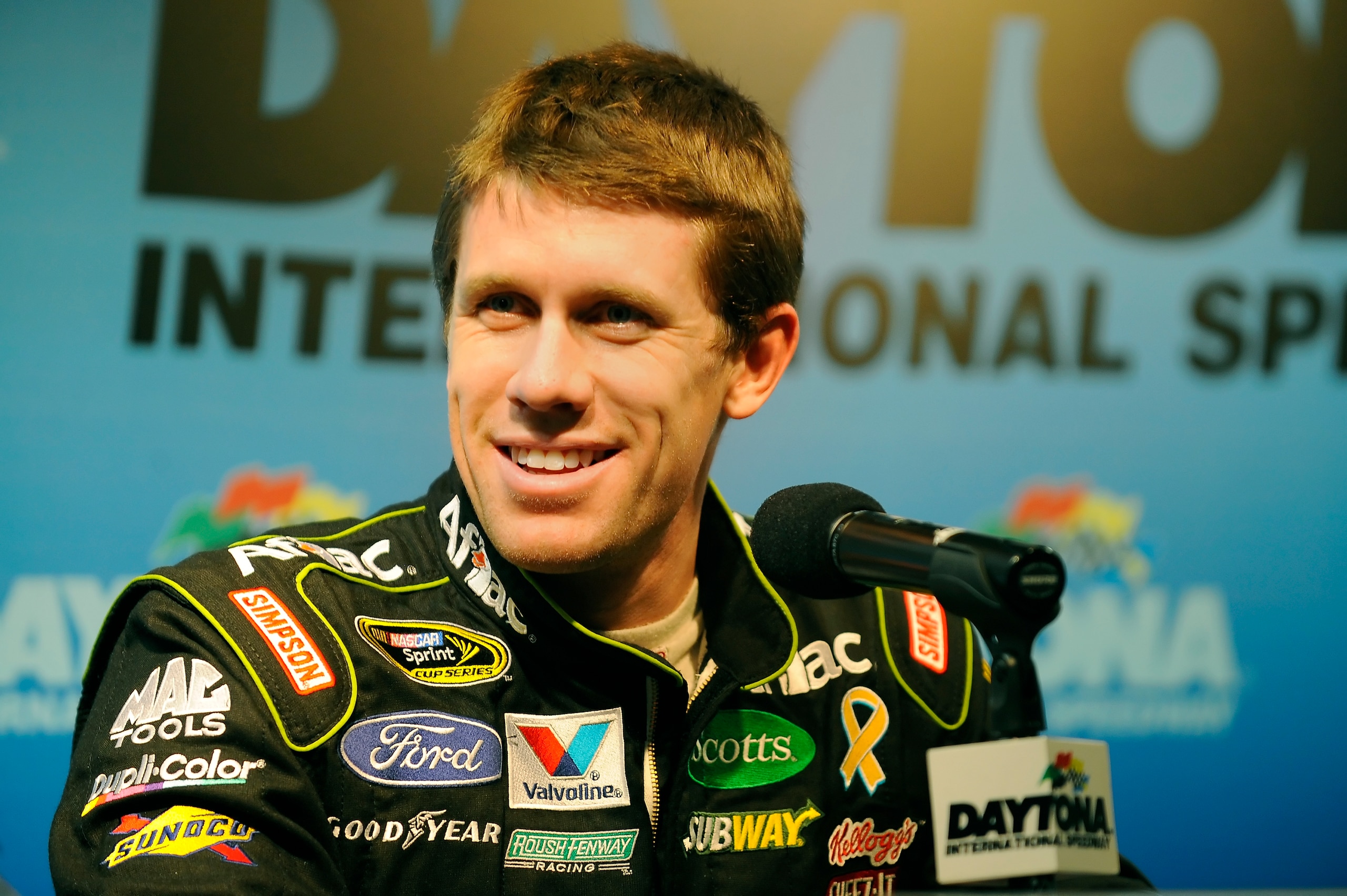 DAYTONA BEACH, FL - JANUARY 20: Carl Edwards, driver of the #99 Aflac Ford, speaks to the media during the break from testing at Daytona International Speedway on January 20, 2011 in Daytona Beach, Florida. (Photo by Jared C. Tilton/Getty Images for NAS DAYTONA BEACH, FL - JANUARY 20: Carl Edwards, driver of the #99 Aflac Ford, speaks to the media during the break from testing at Daytona International Speedway on January 20, 2011 in Daytona Beach, Florida. (Photo by Jared C. Tilton/Getty Images for NAS