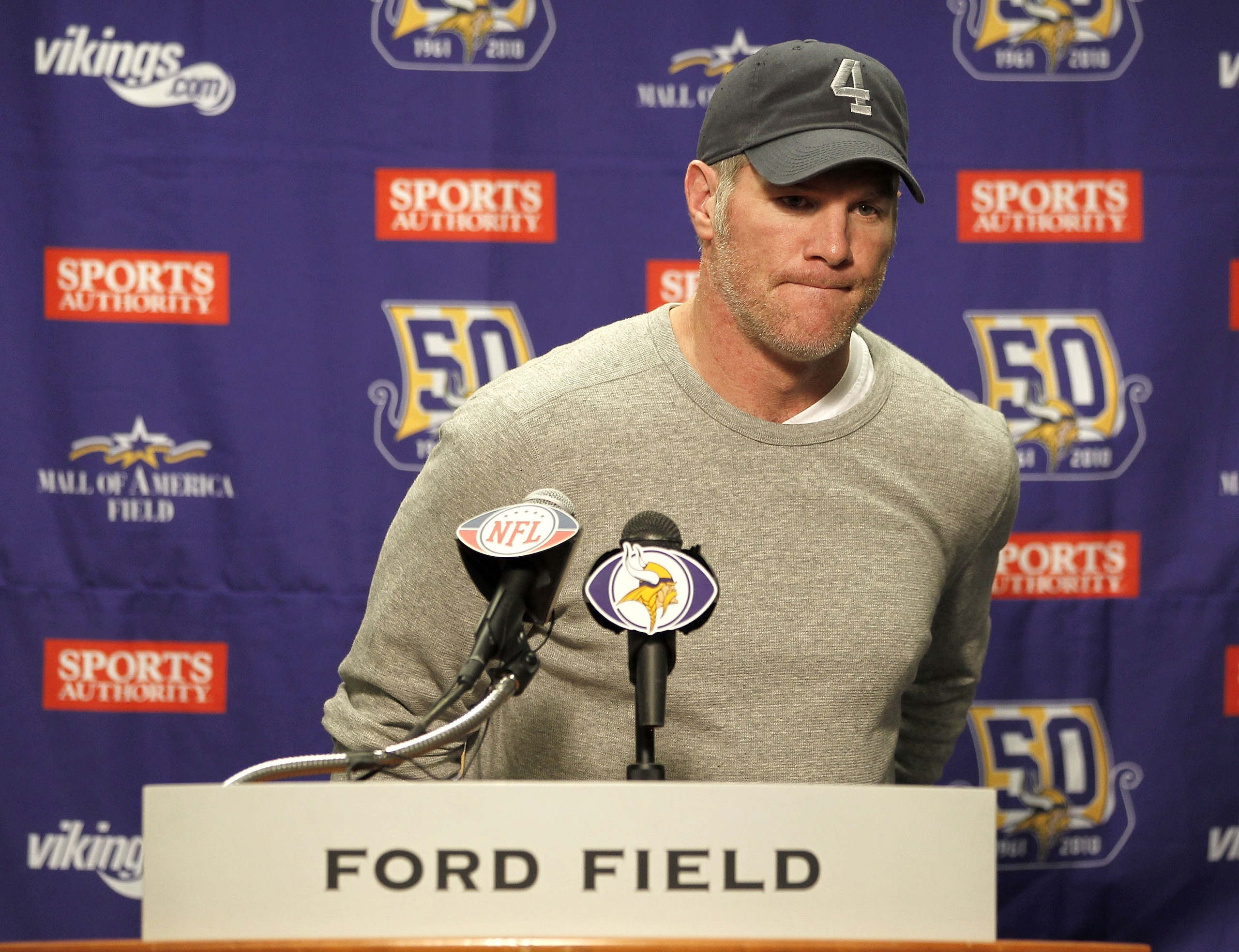 DETROIT, MI - JANUARY 02: Brett Favre #4 of the Minnesota Vikings talks at a post game press conference after a 13-20 loss to the Detroit Lions at Ford Field on January 2, 2011 in Detroit, Michigan. (Photo by Gregory Shamus/Getty Images) DETROIT, MI - JANUARY 02: Brett Favre #4 of the Minnesota Vikings talks at a post game press conference after a 13-20 loss to the Detroit Lions at Ford Field on January 2, 2011 in Detroit, Michigan. (Photo by Gregory Shamus/Getty Images)