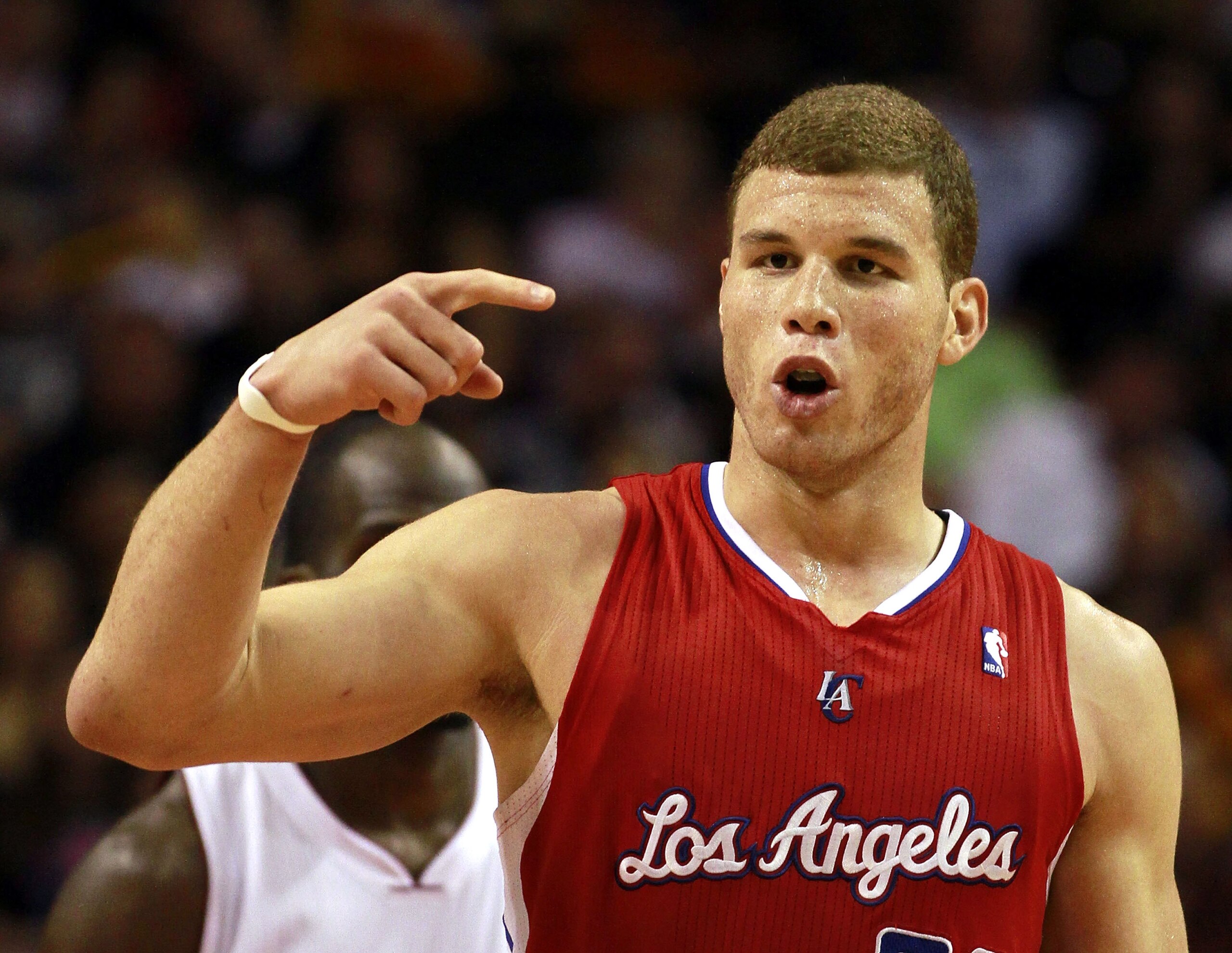 MIAMI, FL - FEBRUARY 06: Forward Blake Griffin of the Los Angeles Clippers reacts against the Miami Heat at American Airlines Arena on February 6, 2011 in Miami, Florida. The Heat defeated the Clippers 97-79. NOTE TO USER: User expressly acknowledges and MIAMI, FL - FEBRUARY 06: Forward Blake Griffin of the Los Angeles Clippers reacts against the Miami Heat at American Airlines Arena on February 6, 2011 in Miami, Florida. The Heat defeated the Clippers 97-79. NOTE TO USER: User expressly acknowledges and