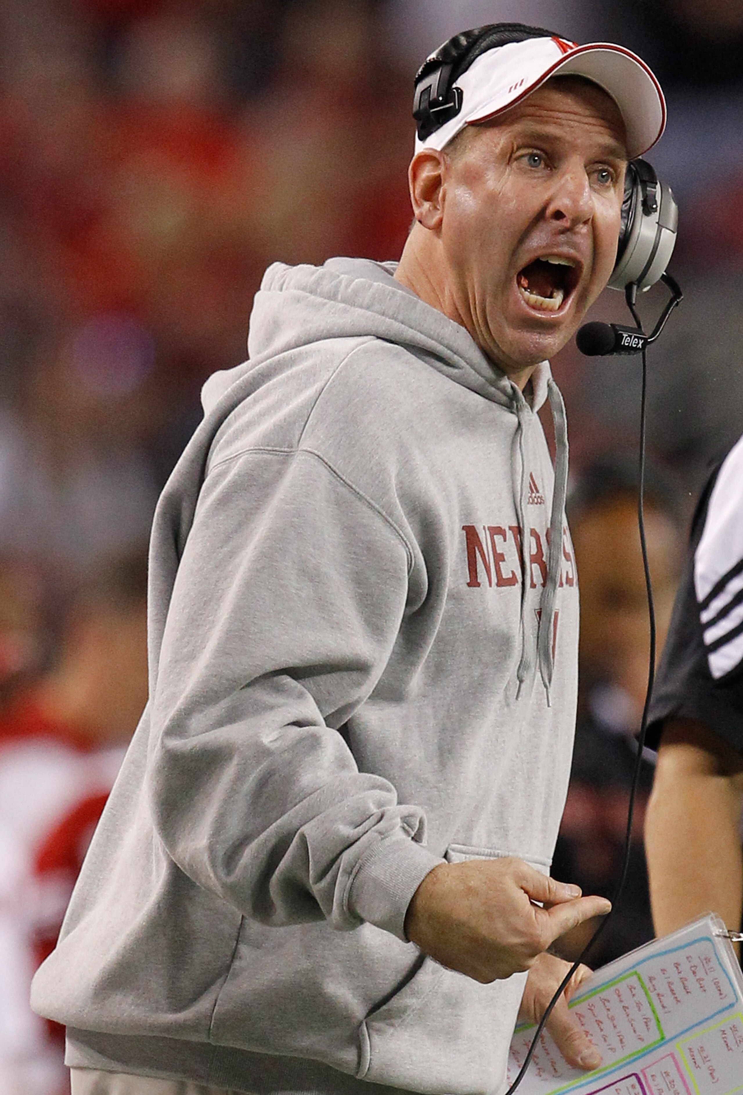 ARLINGTON, TX - DECEMBER 04: Head coach Bo Pelini of the Nebraska Cornhuskers leads his team against the Oklahoma Sooners at Cowboys Stadium on December 4, 2010 in Arlington, Texas. The Sooners beat the Cornhuskers 23-20. (Photo by Tom Pennington/Getty ARLINGTON, TX - DECEMBER 04: Head coach Bo Pelini of the Nebraska Cornhuskers leads his team against the Oklahoma Sooners at Cowboys Stadium on December 4, 2010 in Arlington, Texas. The Sooners beat the Cornhuskers 23-20. (Photo by Tom Pennington/Getty