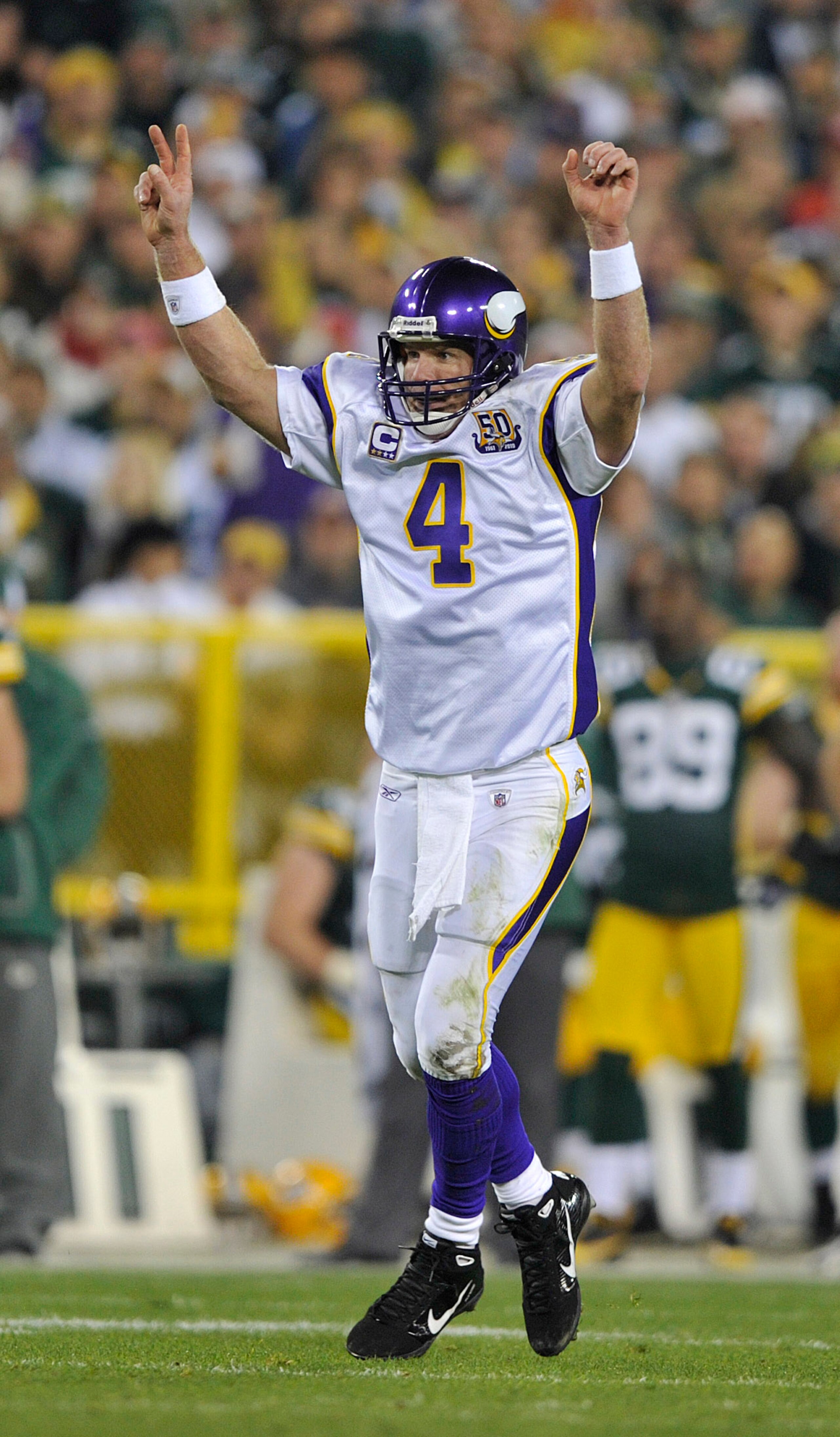 GREEN BAY, WI - OCTOBER 24: Brett Favre #4 of the Minnesota Vikings celebrates a touchdown against the Green Bay Packers at Lambeau Field on October 24, 2010 in Green Bay, Wisconsin. (Photo by Jim Prisching/Getty Images) GREEN BAY, WI - OCTOBER 24: Brett Favre #4 of the Minnesota Vikings celebrates a touchdown against the Green Bay Packers at Lambeau Field on October 24, 2010 in Green Bay, Wisconsin. (Photo by Jim Prisching/Getty Images)