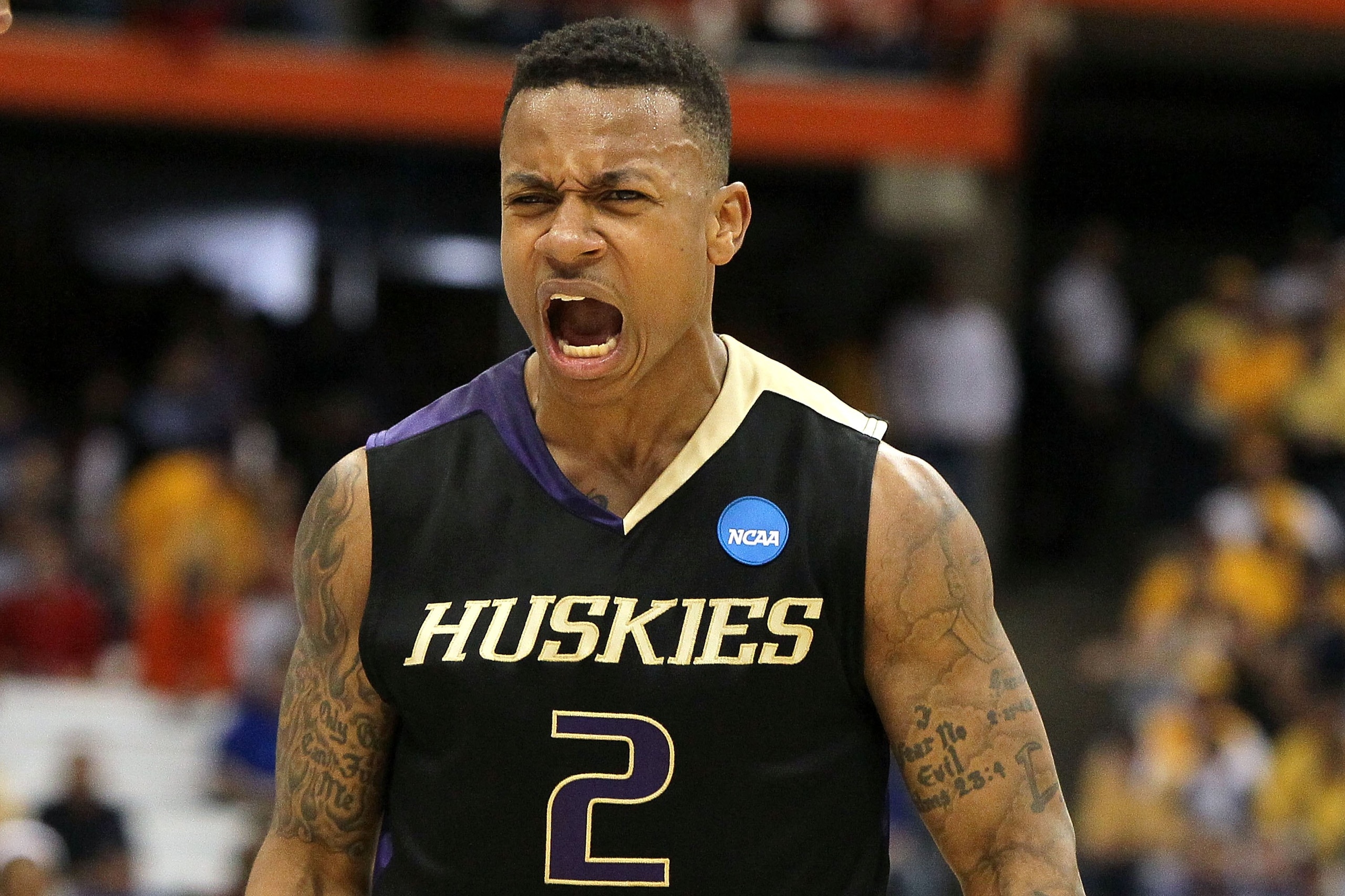 SYRACUSE, NY - MARCH 25:  Isaiah Thomas #2 of the Washington Huskies reacts against the West Virginia Mountaineers during the east regional semifinal of the 2010 NCAA men's basketball tournament at the Carrier Dome on March 25, 2010 in Syracuse, New York.