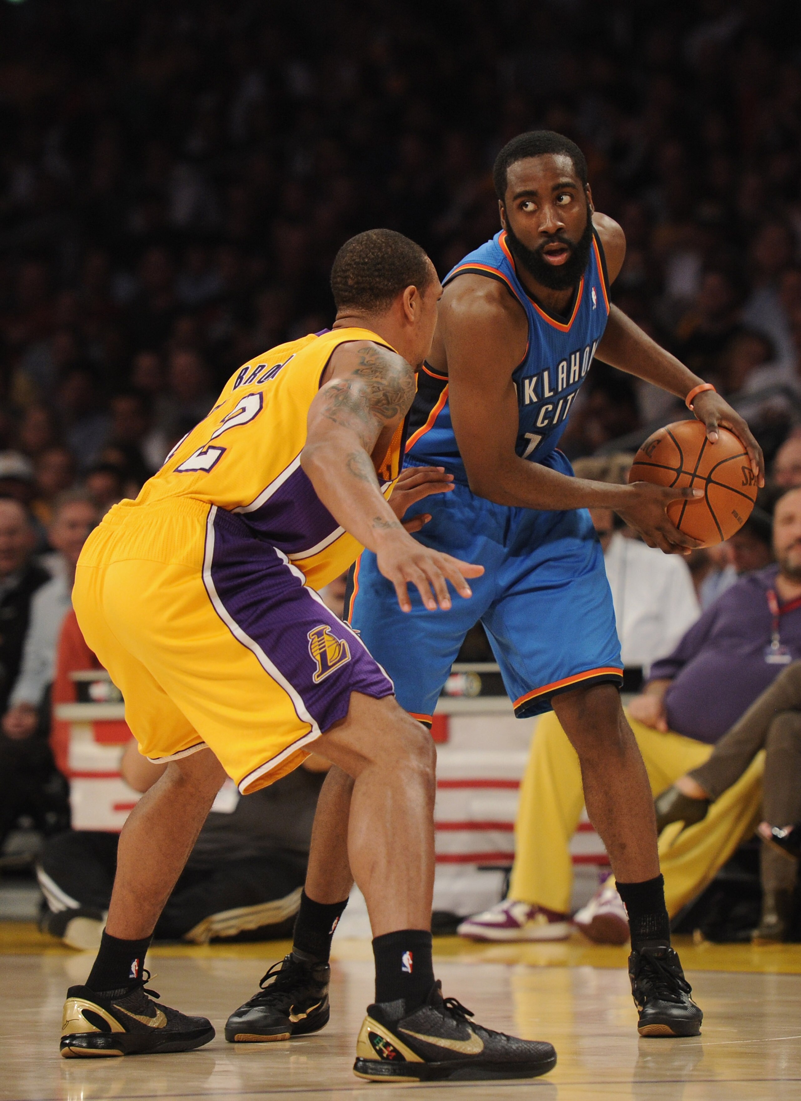 LOS ANGELES, CA - JANUARY 17: James Harden #13 of the Oklahoma City Thunder is guarded by Derek Fisher #2 of the Los Angeles Lakers at the Staples Center on January 17, 2011 in Los Angeles, California. NOTE TO USER: User expressly acknowledges and agre LOS ANGELES, CA - JANUARY 17: James Harden #13 of the Oklahoma City Thunder is guarded by Derek Fisher #2 of the Los Angeles Lakers at the Staples Center on January 17, 2011 in Los Angeles, California. NOTE TO USER: User expressly acknowledges and agre