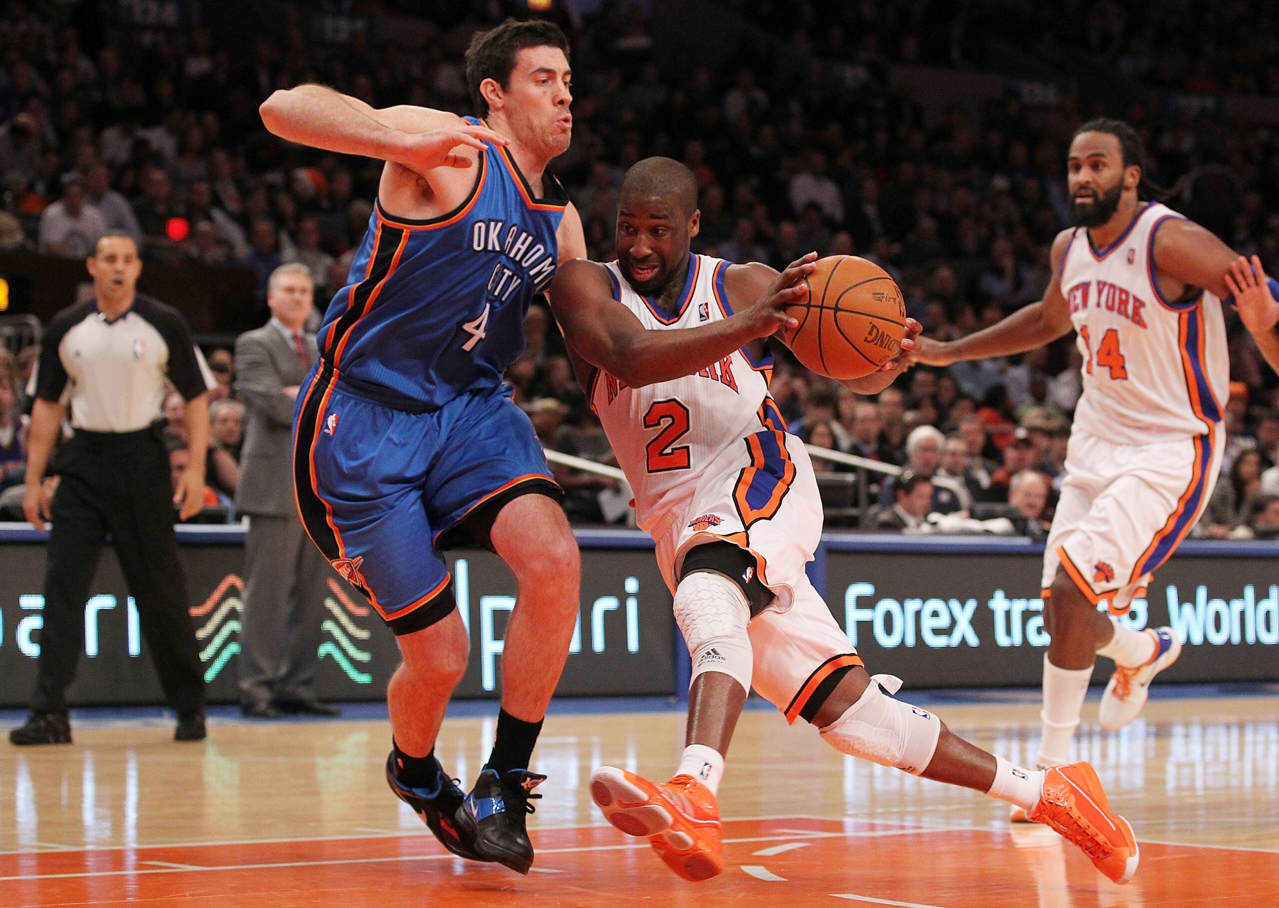 NEW YORK, NY - DECEMBER 22: Raymond Felton #2 of the New York Knicks drives against Anthony Randolph #4 of the Oklahoma City Thunder at Madison Square Garden on December 22, 2010 in New York City. NOTE TO USER: User expressly acknowledges and agrees th NEW YORK, NY - DECEMBER 22: Raymond Felton #2 of the New York Knicks drives against Anthony Randolph #4 of the Oklahoma City Thunder at Madison Square Garden on December 22, 2010 in New York City. NOTE TO USER: User expressly acknowledges and agrees th