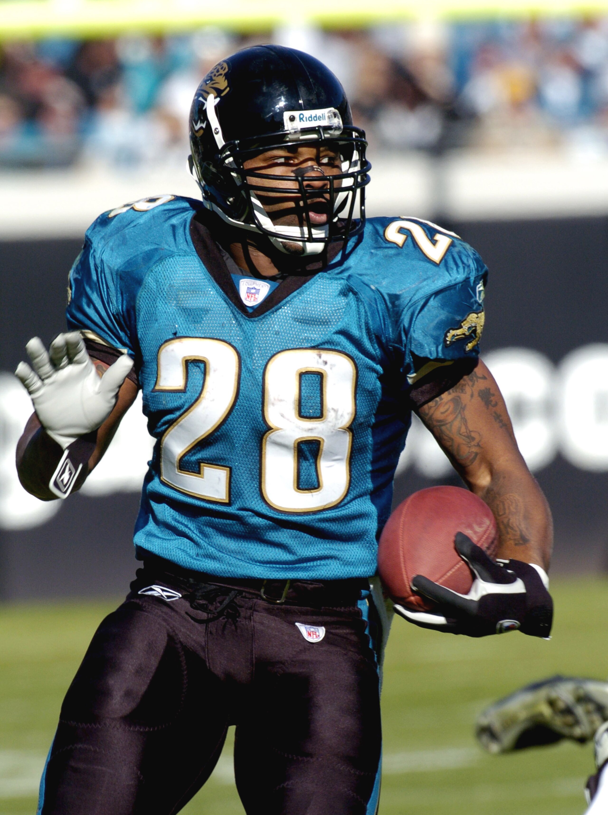 Jacksonville Jaguars running back Fred Taylor rushes for 194 yards December 21, 2003 at Alltel Stadium, Jacksonville, Florida.  The Jaguars defeated the  New Orleans Saints 20 - 19.  (Photo by Al Messerschmidt/Getty Images)