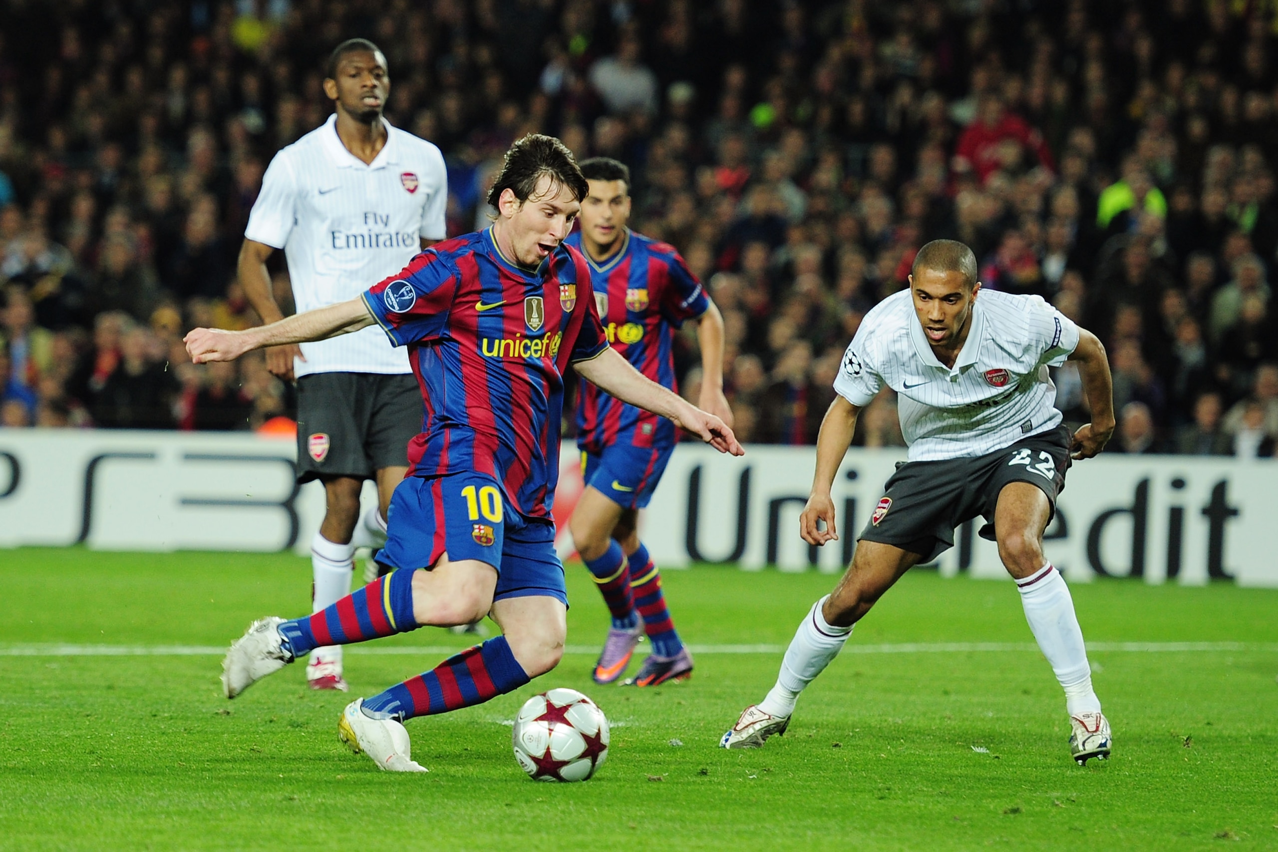 BARCELONA, SPAIN - APRIL 06:  Lionel Messi of Barcelona is challenged by Gaël Clichy of Arsenal during the UEFA Champions League quarter final second leg match between Barcelona and Arsenal at Camp Nou on April 6, 2010 in Barcelona, Spain.  (Photo by Shau
