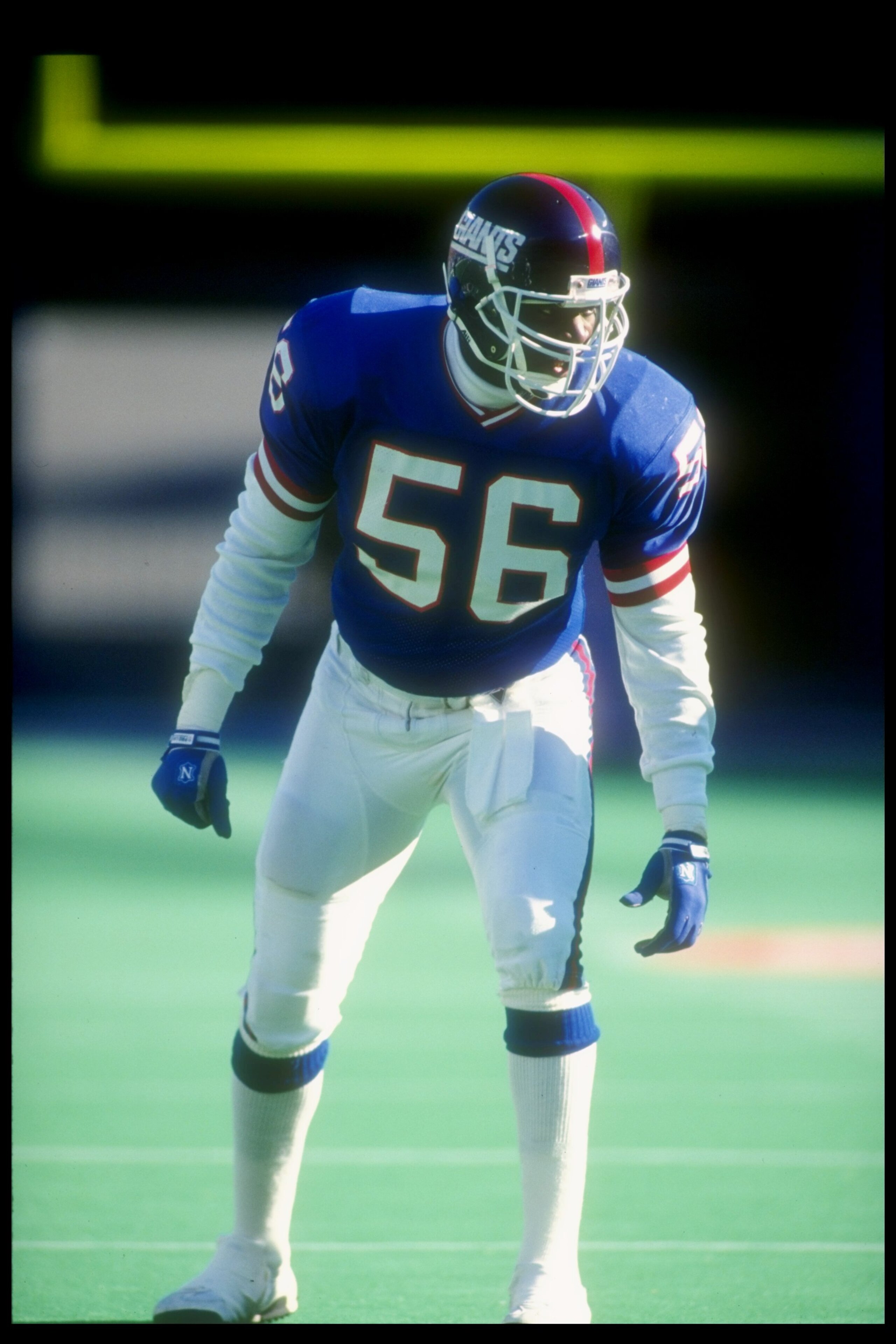 18 Nov 1990:  Linebacker Lawrence Taylor of the New York Giants looks on during a game against the Detroit Lions at Giants Stadium in East Rutherford, New Jersey.  The Giants won the game, 20-0. Mandatory Credit: Rick Stewart  /Allsport