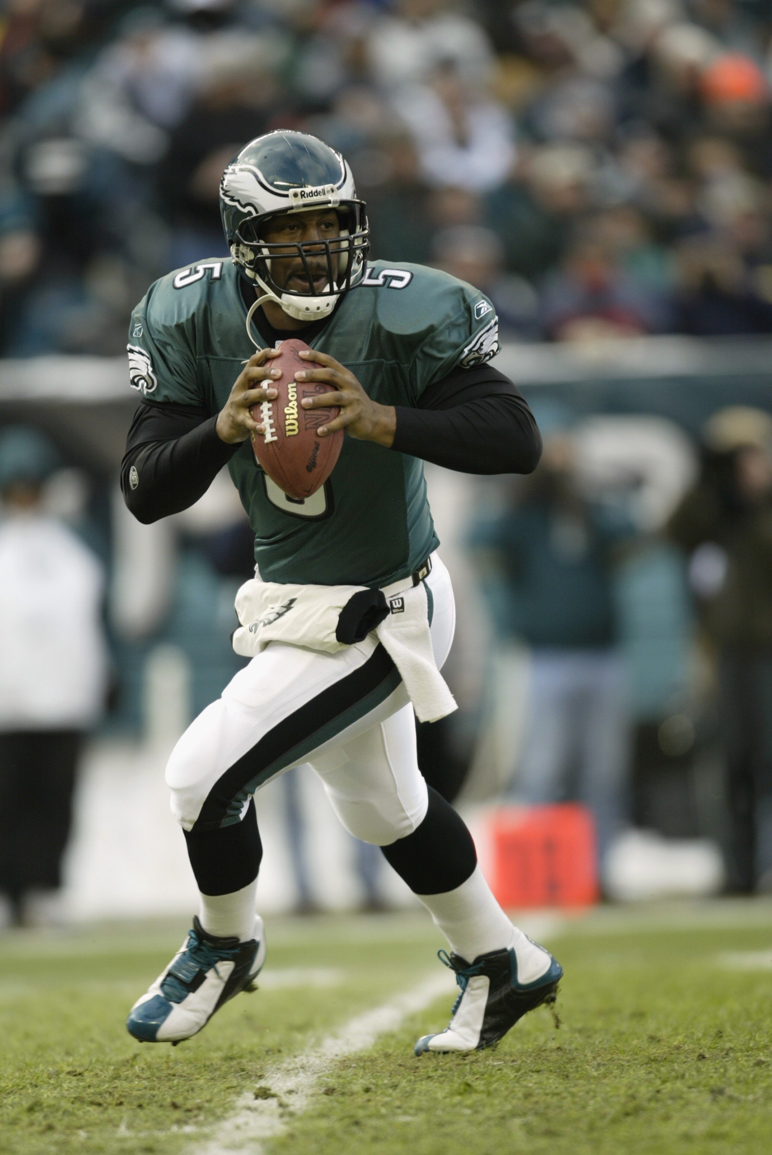PHILADELPHIA - DECEMBER 7:  Quarterback Donovan McNabb #5 of the Philadelphia Eagles looks for an opening against the Dallas Cowboys at Lincoln Financial Field on December 7, 2003 in Philadelphia, Pennsylvania.  The Eagles defeated the Cowboys 36-10.  (Ph