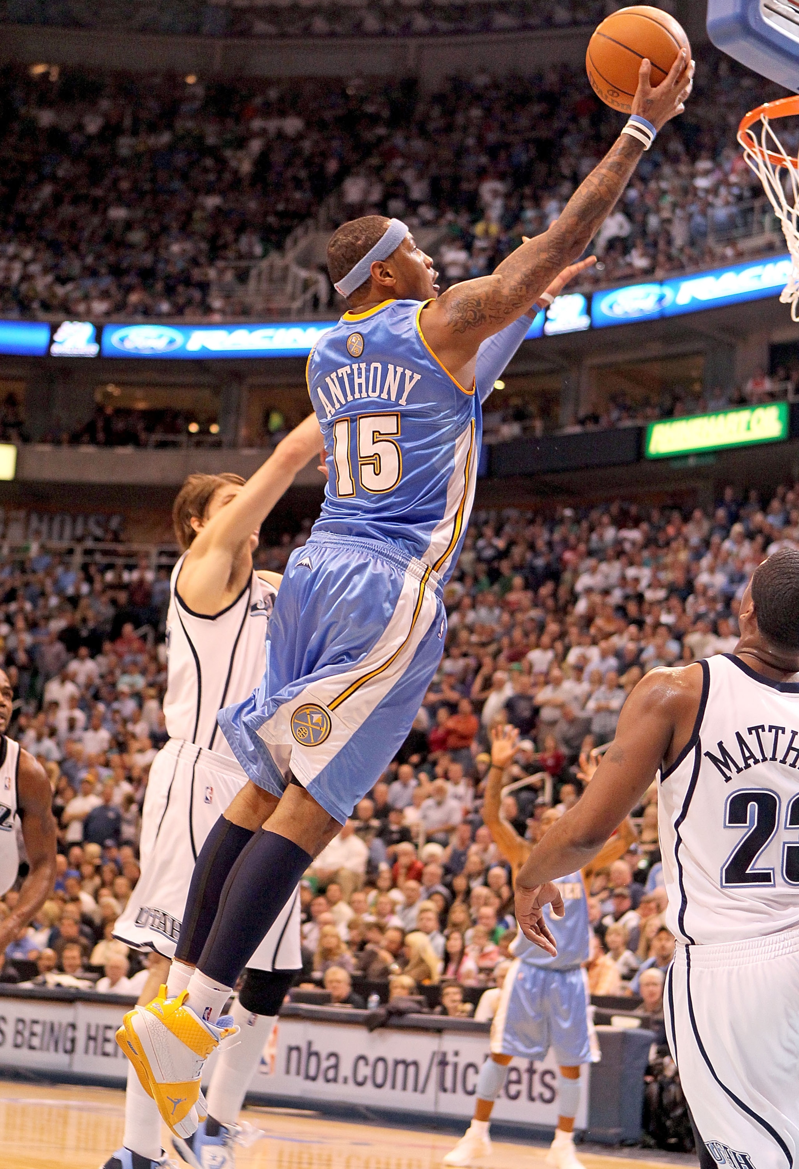 SALT LAKE CITY - APRIL 23: Carmelo Anthony #15 of the Denver Nuggets shoots the ball against the Utah Jazz during Game 3 of the Western Conference Quarterfinals of the 2010 NBA Playoffs at EnergySolutions Arena on April 23, 2010 in Salt Lake City, Utah. SALT LAKE CITY - APRIL 23: Carmelo Anthony #15 of the Denver Nuggets shoots the ball against the Utah Jazz during Game 3 of the Western Conference Quarterfinals of the 2010 NBA Playoffs at EnergySolutions Arena on April 23, 2010 in Salt Lake City, Utah.