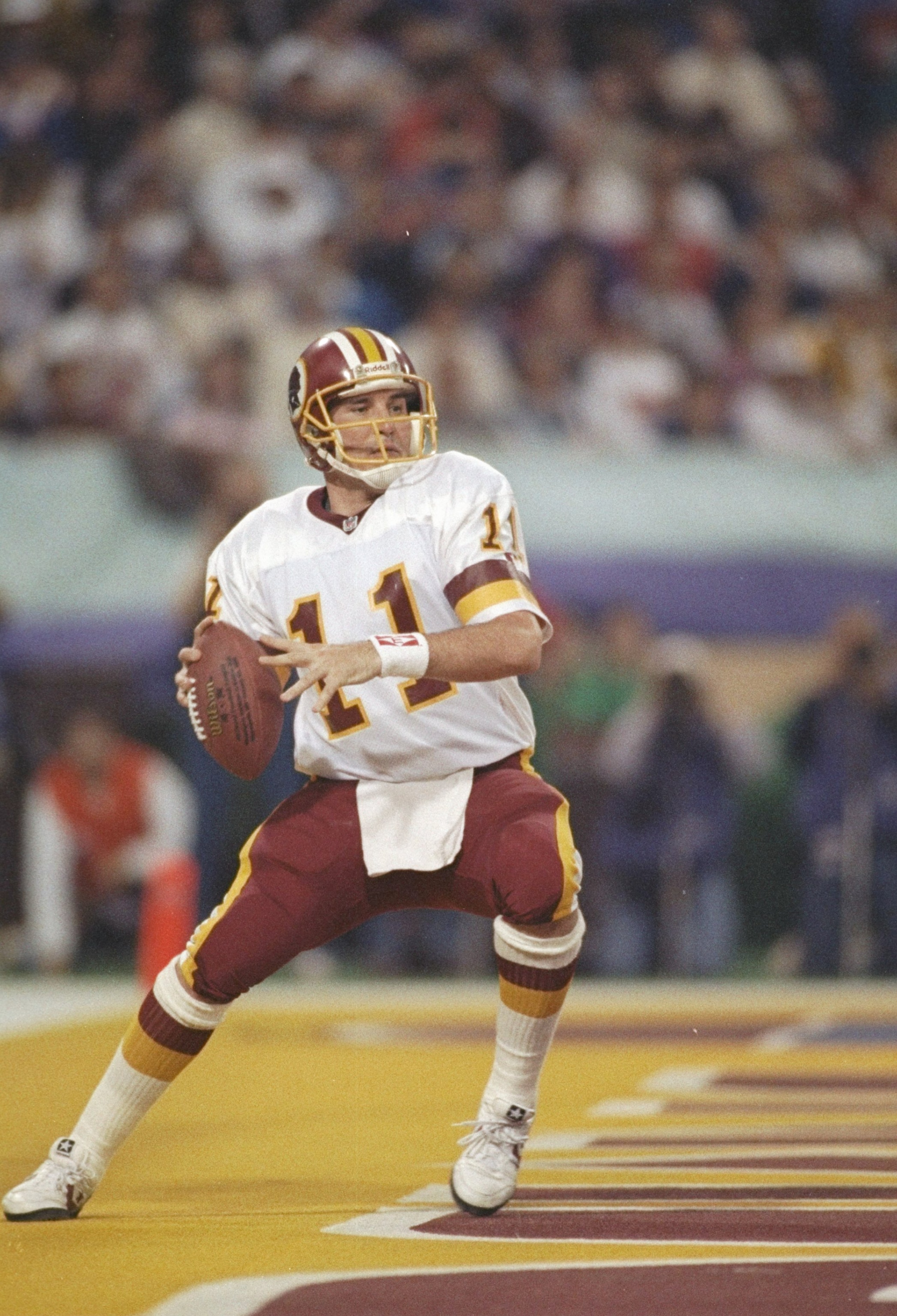 26 Jan 1992:  Quarterback Mark Rypien of the Washington Redskins looks to pass the ball during Super Bowl XXVI against the Buffalo Bills at the Hubert H. Humphrey Metrodome in Minneapolis, Minnesota.  The Reskins won the game, 37-24.  Rypien was named the