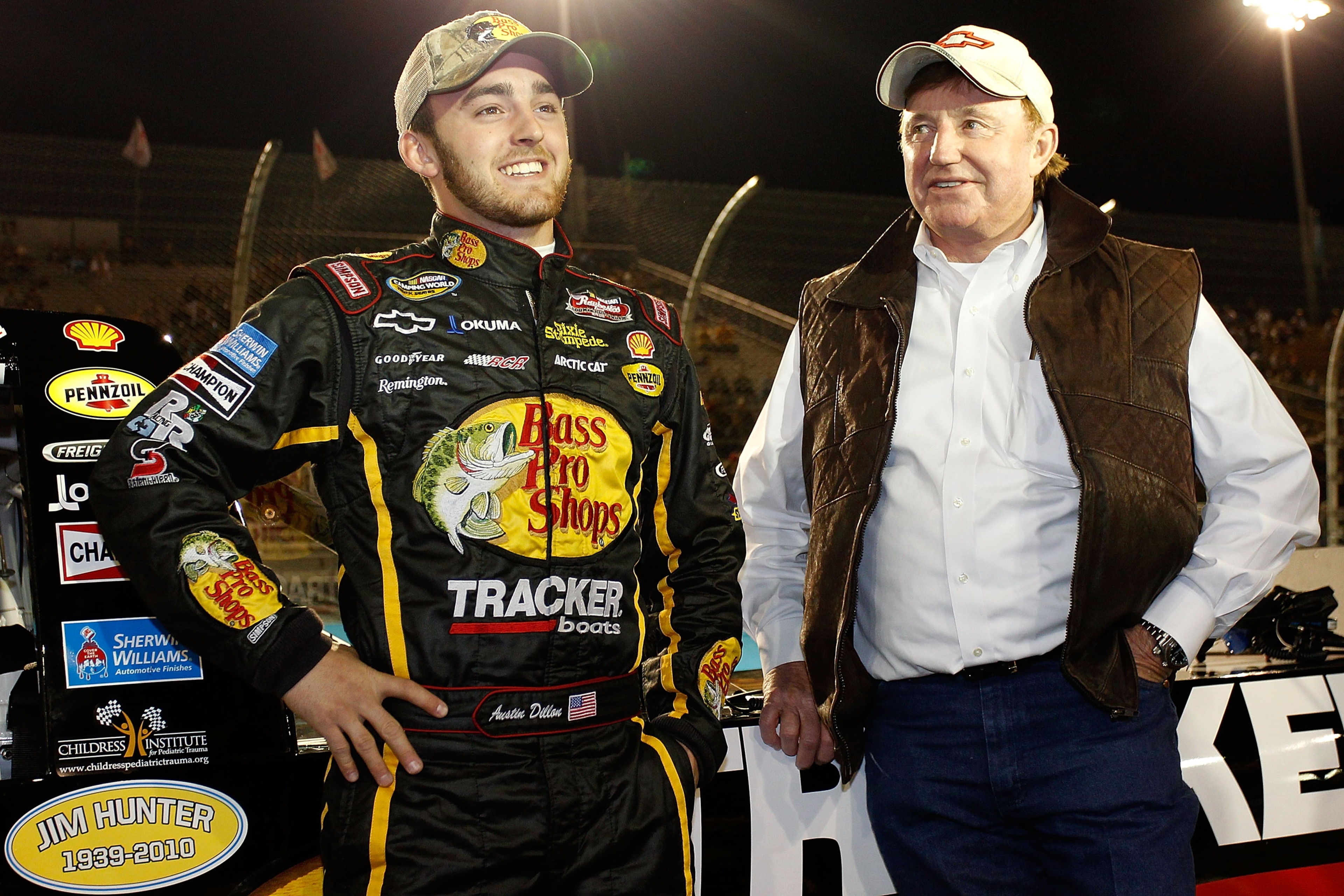 AVONDALE, AZ - NOVEMBER 12: Austin Dillon, driver of the #3 Bass Pro Shops Chevrolet, speaks with Richard Childress prior to the NASCAR Camping World Truck Series Lucas Oil 150 at Phoenix International Raceway on November 12, 2010 in Avondale, Arizona. AVONDALE, AZ - NOVEMBER 12: Austin Dillon, driver of the #3 Bass Pro Shops Chevrolet, speaks with Richard Childress prior to the NASCAR Camping World Truck Series Lucas Oil 150 at Phoenix International Raceway on November 12, 2010 in Avondale, Arizona.