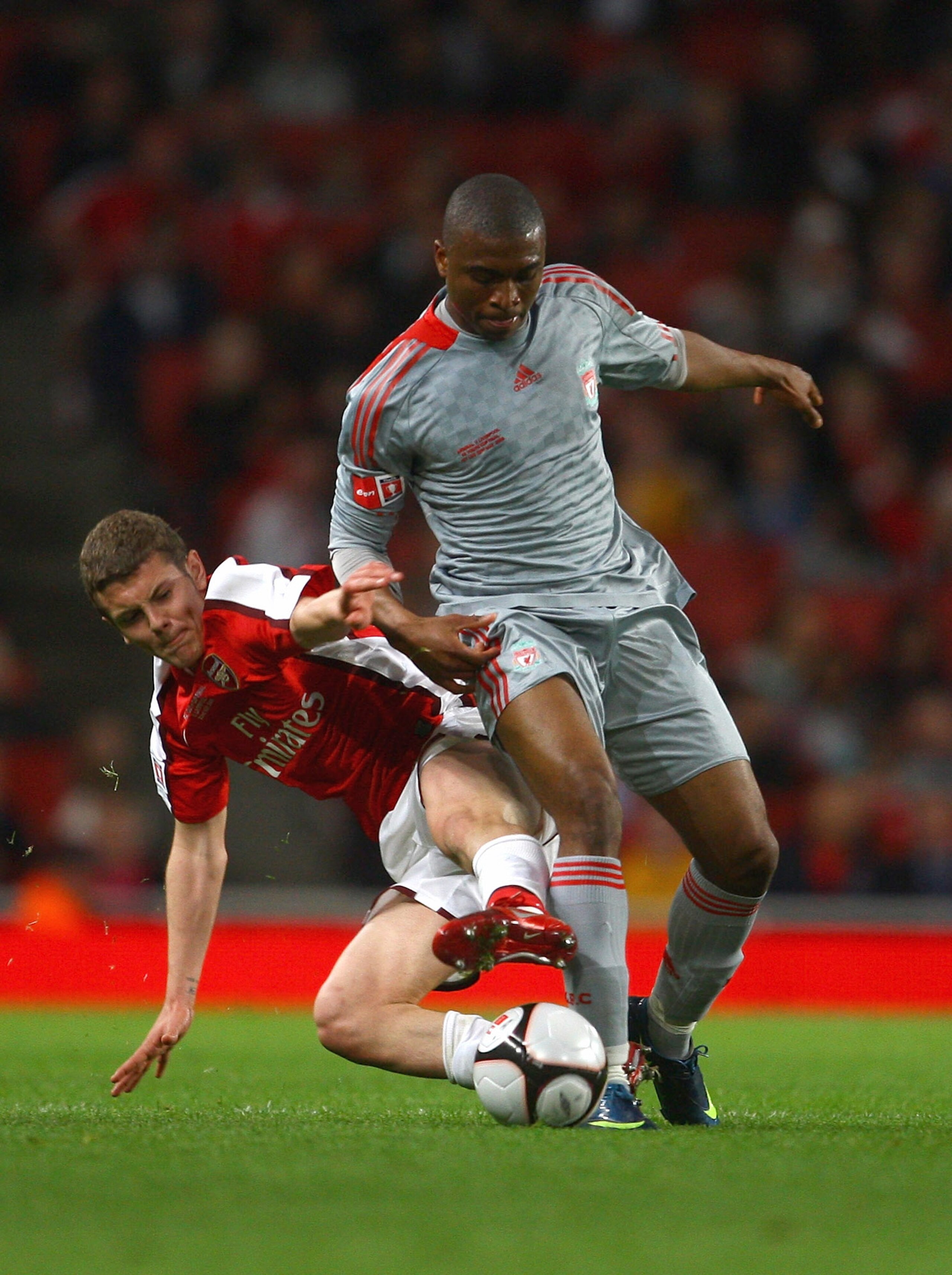 LONDON, ENGLAND - MAY 22:  David Amoo of Liverpool battles with Jack Wilshere of Arsenal during the FA Youth Cup Final 1st Leg match between Arsenal and Liverpool at The Emirates Stadium on May 22, 2009 in London, England.  (Photo by Julian Finney/Getty I