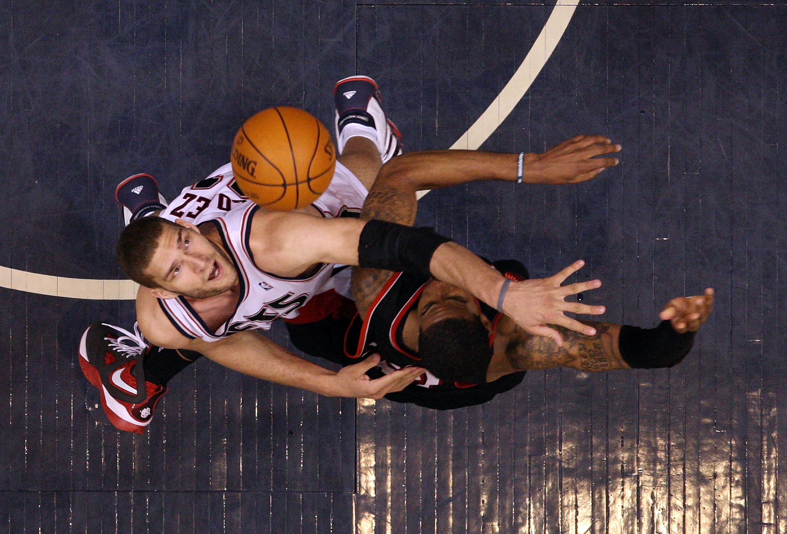 EAST RUTHERFORD, NJ - FEBRUARY 23: Brook Lopez #11 of the New Jersey Nets blocks a shot from LaMarcus Aldridge #12 of the Portland Trail Blazers at the Izod Center on February 23, 2010 in East Rutherford, New Jersey.The Blazers defeated the Nets 102-93. EAST RUTHERFORD, NJ - FEBRUARY 23: Brook Lopez #11 of the New Jersey Nets blocks a shot from LaMarcus Aldridge #12 of the Portland Trail Blazers at the Izod Center on February 23, 2010 in East Rutherford, New Jersey.The Blazers defeated the Nets 102-93.