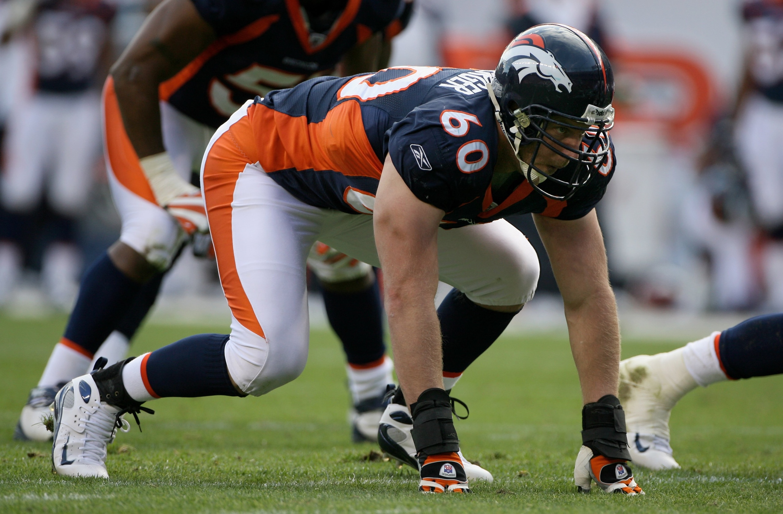 DENVER - NOVEMBER 02: Defensive end John Engelberger #60 of the Denver Broncos defends against the Miami Dolphins during NFL action at Invesco Field at Mile High on November 2, 2008 in Denver, Colorado. The Dolphins defeated the Broncos 26-17. (Photo by DENVER - NOVEMBER 02: Defensive end John Engelberger #60 of the Denver Broncos defends against the Miami Dolphins during NFL action at Invesco Field at Mile High on November 2, 2008 in Denver, Colorado. The Dolphins defeated the Broncos 26-17. (Photo by