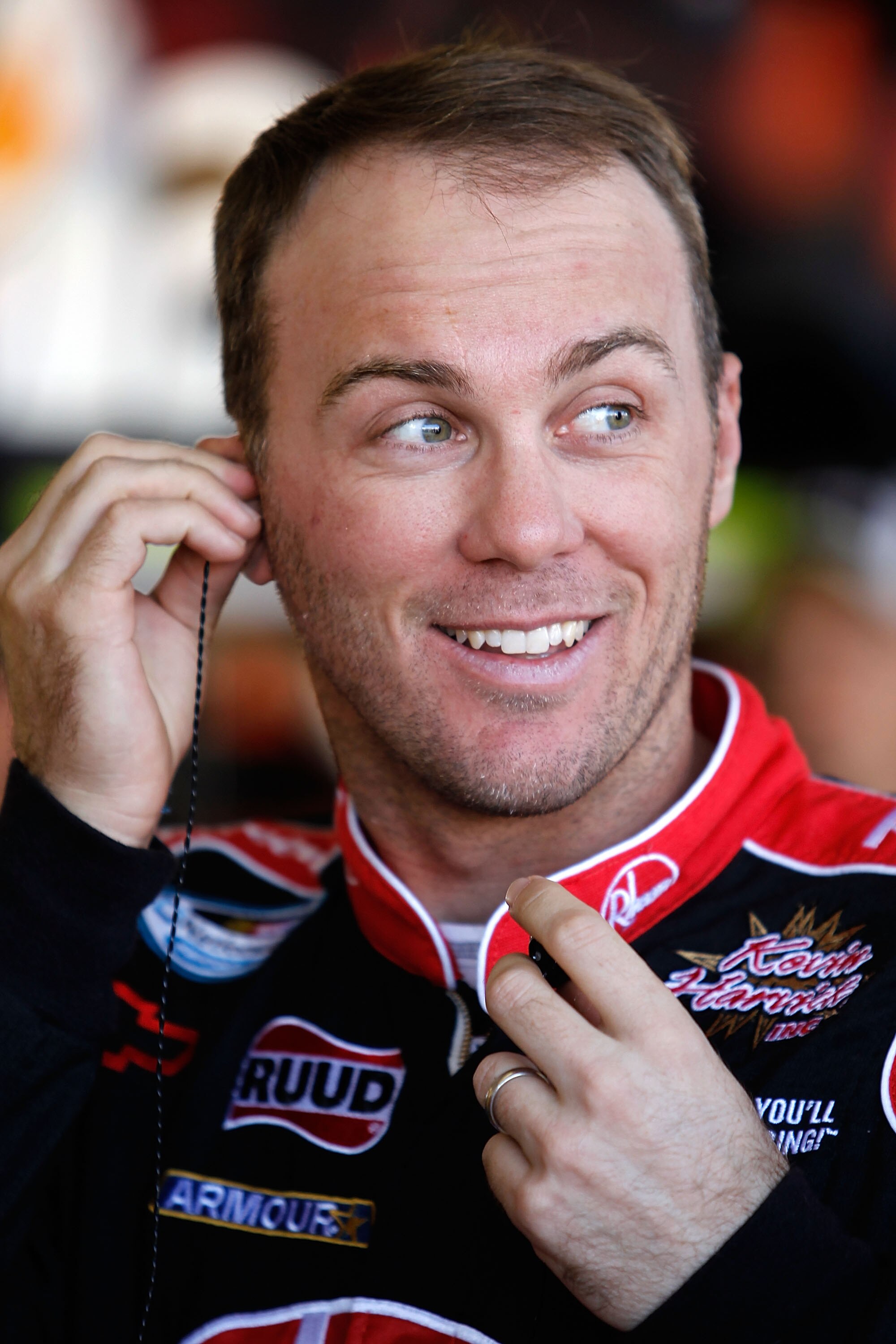 AVONDALE, AZ - NOVEMBER 13:  Kevin Harvick, driver of the #29 Shell/Pennzoil Chevrolet looks on from the garage area during practice for the NASCAR Sprint Cup Series Kobalt Tools 500 at Phoenix International Raceway on November 13, 2010 in Avondale, Arizo