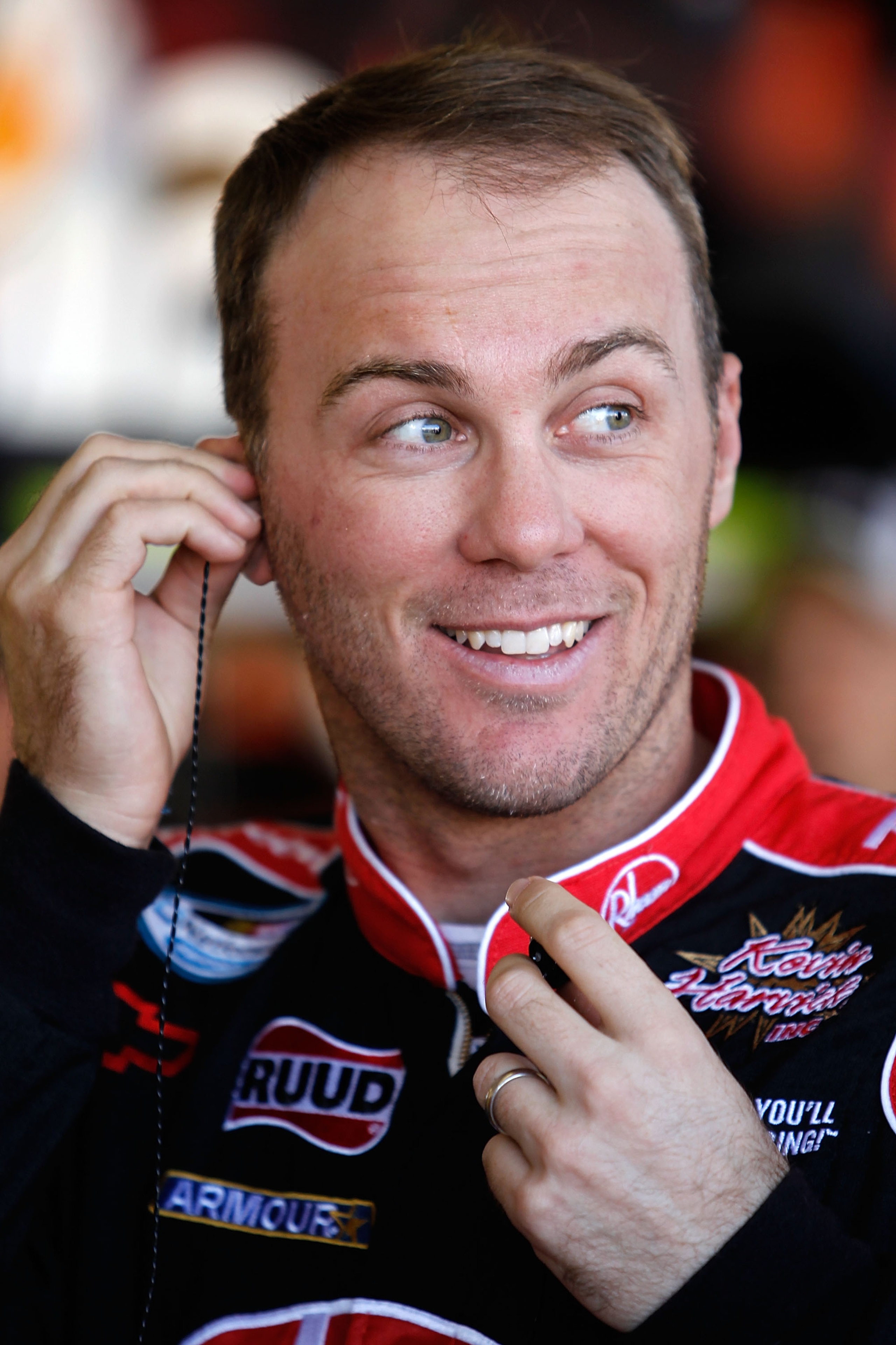 AVONDALE, AZ - NOVEMBER 13:  Kevin Harvick, driver of the #29 Shell/Pennzoil Chevrolet looks on from the garage area during practice for the NASCAR Sprint Cup Series Kobalt Tools 500 at Phoenix International Raceway on November 13, 2010 in Avondale, Arizo