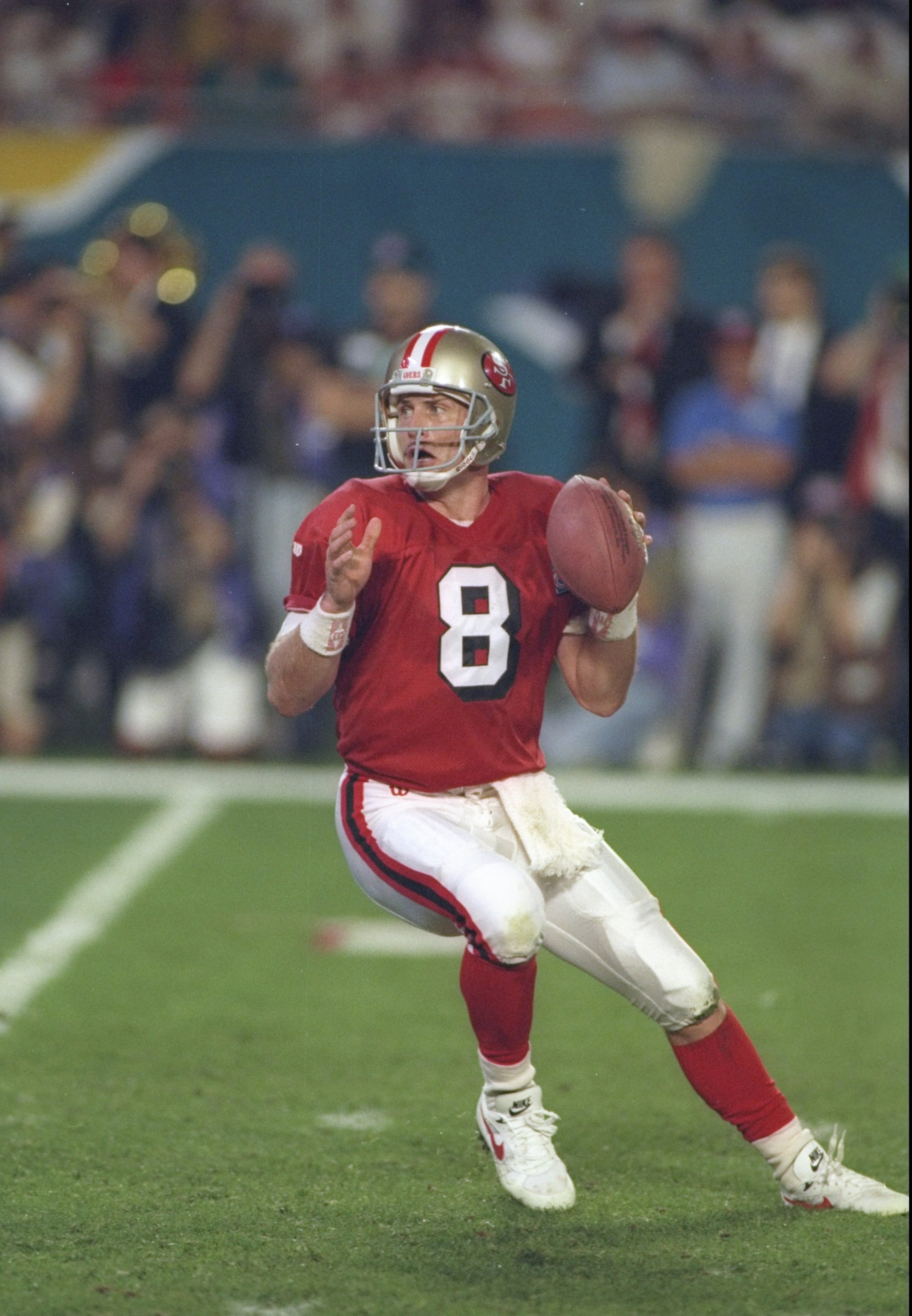 29 Jan 1995:  Quarter back Steve Young of the San Francisco 49ers is ready to throw the ball in the first quarter of Super Bowl XXIX against the San Diego Chargers at  the Joe Robbie Stadium in Miami, Florida.  Steve Young was the MVP and the 49ers won 49