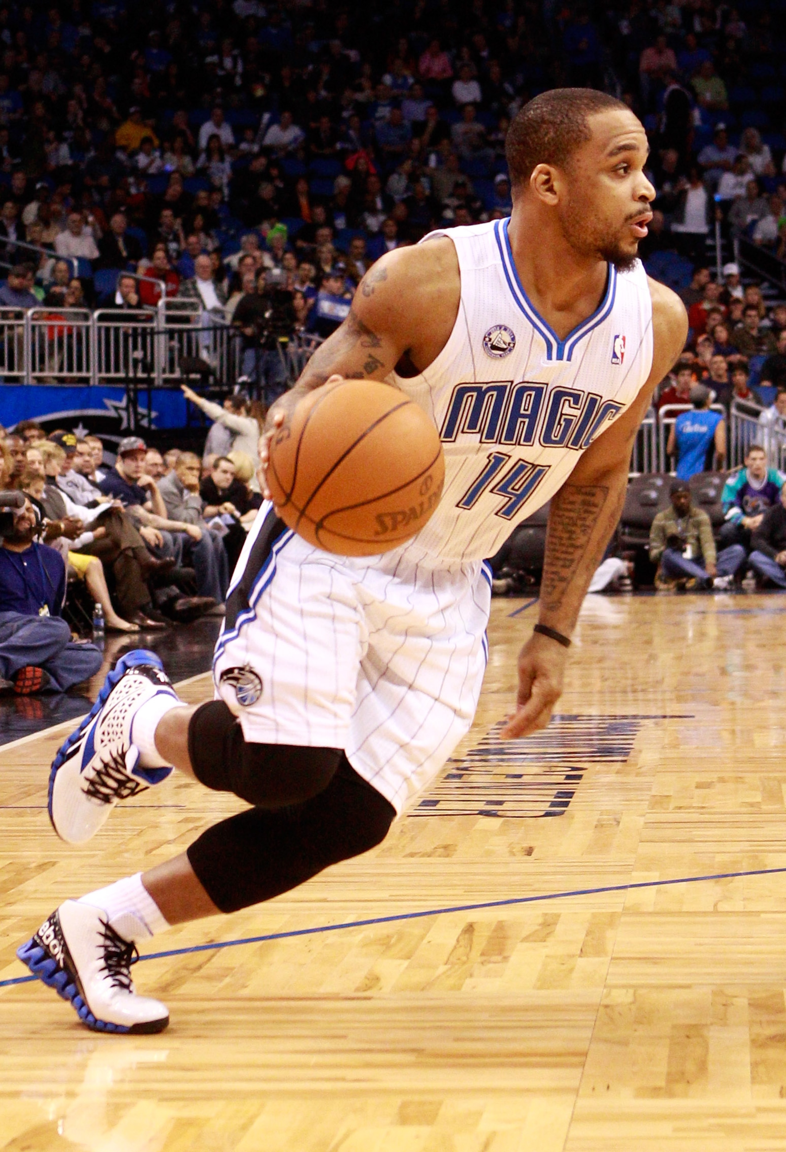 ORLANDO, FL - JANUARY 24: Jameer Nelson #14 of the Orlando Magic drives to the basket during the game against the Detroit Pistons at Amway Arena on January 24, 2011 in Orlando, Florida. NOTE TO USER: User expressly acknowledges and agrees that, by downl ORLANDO, FL - JANUARY 24: Jameer Nelson #14 of the Orlando Magic drives to the basket during the game against the Detroit Pistons at Amway Arena on January 24, 2011 in Orlando, Florida. NOTE TO USER: User expressly acknowledges and agrees that, by downl