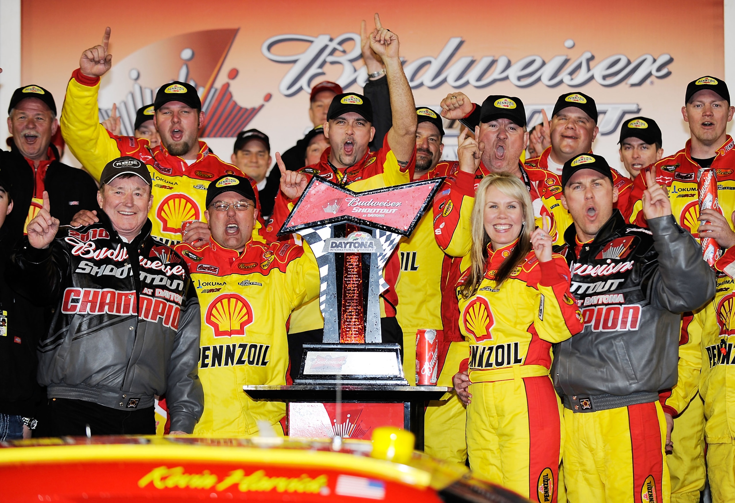 DAYTONA BEACH, FL - FEBRUARY 06:  Kevin Harvick (R), driver of the #29 Shell/Pennzoil Chevrolet, celebrates winning the Budweiser Shootout with his wife DeLana (2nd from R) and team owner Richard Childress (L) at Daytona International Speedway on February