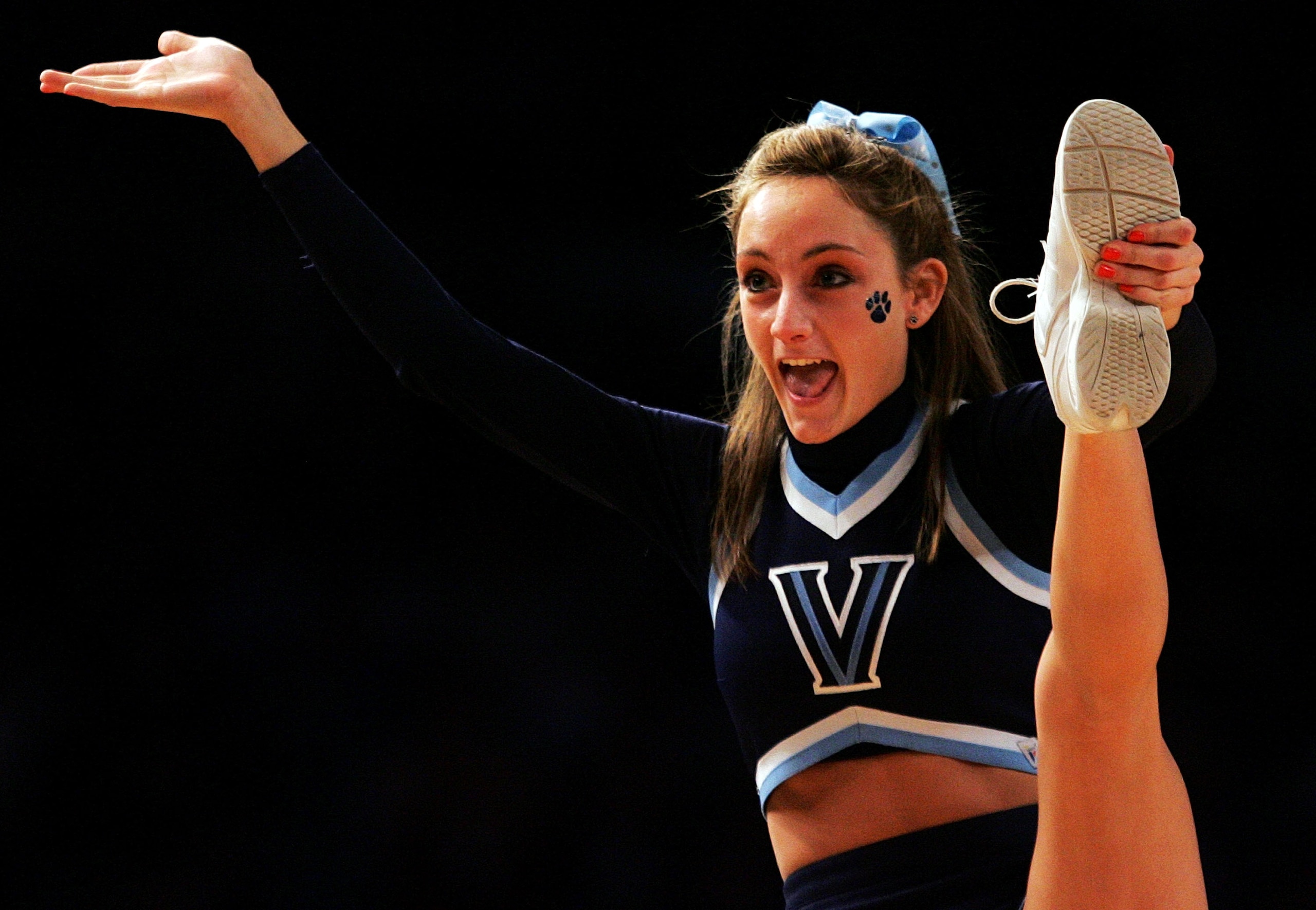 NEW YORK - MARCH 13:  A cheerleader for the Villanova Wildcats performs during a game against the Georgetown Hoyas during day two of the 2008 Big East Men's Basketball Championship at Madison Square Garden on March 13, 2008 in New York City.  (Photo by Ji